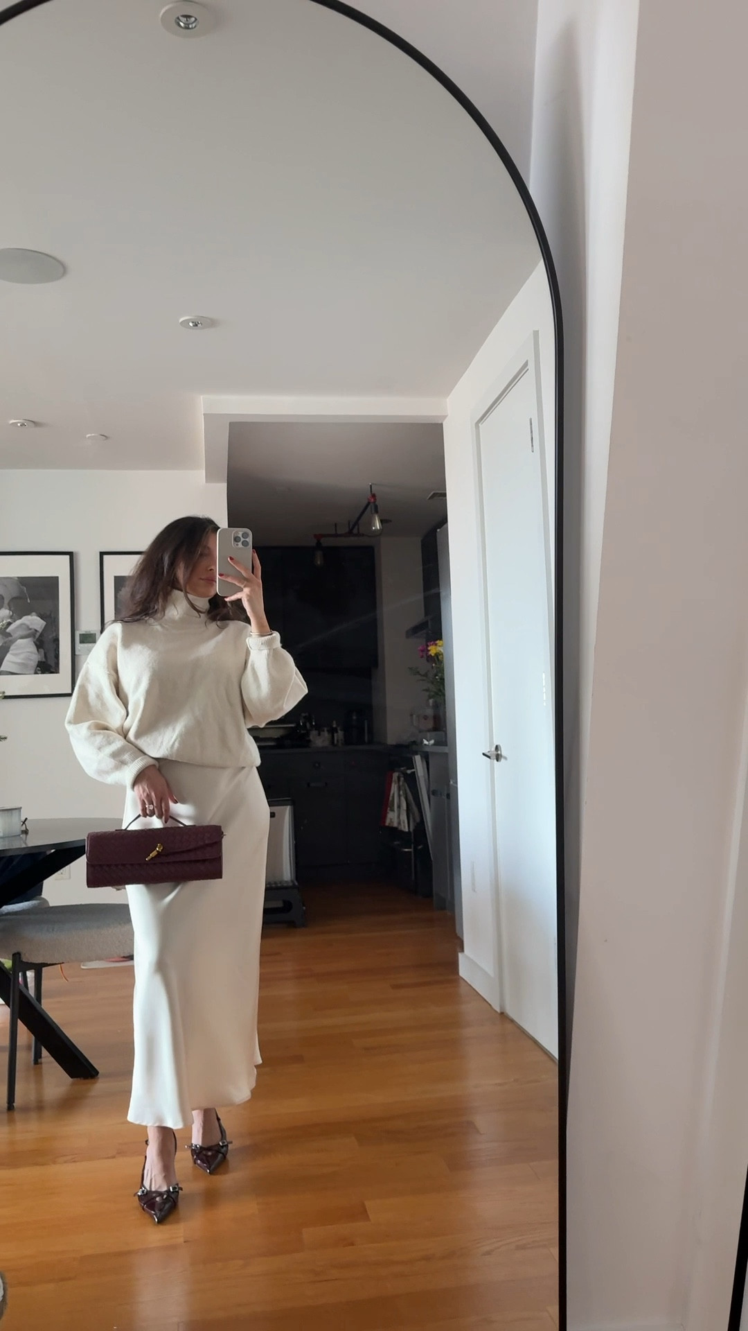 Winter whites🤍✨
Obsessed with this cozy turtleneck + satin skirt combo. Perfect outfit for brunch, holiday plans, or a winter date night. Paired it with a deep burgundy bag for a little contrast (my favorite part of the look).

Linking the exact sweater, similar satin skirts, and heel options that match the vibe.

#LTKgrwm #LTKSeasonal #LTKHoliday