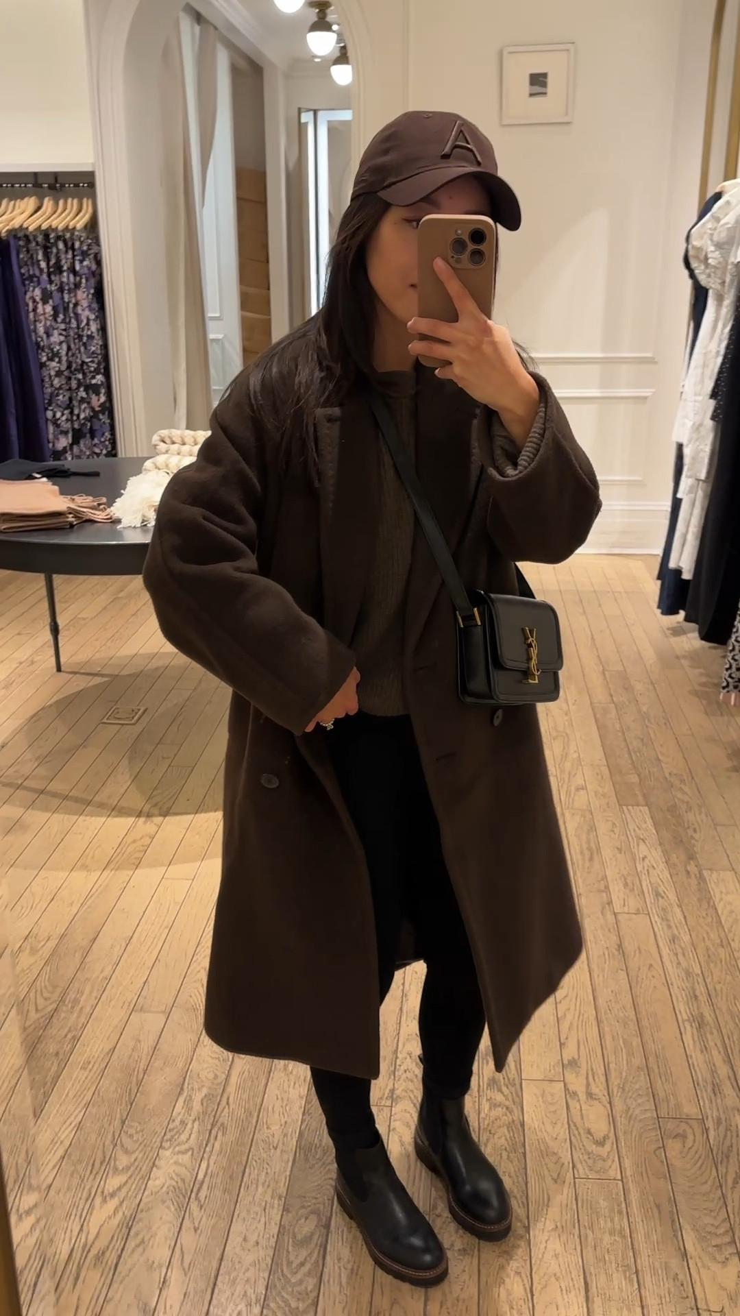 Very warm, winter casual running errands outfit

• on sale: Aritzia slouch coat xxs Short (petite) oversized fit that runs big. Warm soft and fully lined, easy to throw on over chunkier knit or roomy sweaters 

• quince alpaca ribbed cardigan sweater Xs , petite friendly and warm . I am actually wearing this cardigan backwards here for a different look!

I also love The Quince fisherman cashmere crewneck linked in XS for a great elevated everyday sweater, I just don’t own that one in brown so I used another cardigan and wore it backwards 

• code AFJEAN for extra 15% off Abercrombie leggings Xs short lightweight and very soft , I size up so it’s not too snug. Lower compression for lounging or yoga or walks  

• Caslon Chelsea boots size 5

• aritzia baseball cap. Sturdily made and also comes in other great colors like burgundy 

• ysl Saint Laurent Solferino small bag 

#LTKSeasonal #LTKSaleAlert