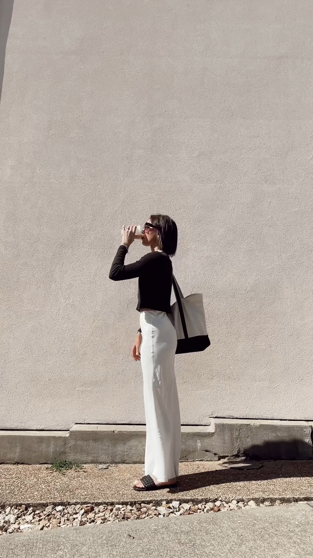 Linen skirt casual summer outfit

linen skirt (exact match below)
woven sandals (similar options below)
black cropped top (similar options below)
canvas tote bag (similar option below)
