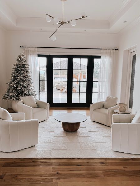 organic modern swivel chairs. They have a $100 off coupon for the set. Loving this furniture update to our formal living room. Such a great place to sit and have coffee and a conversation☺️

#LTKhome #LTKSeasonal #LTKHoliday