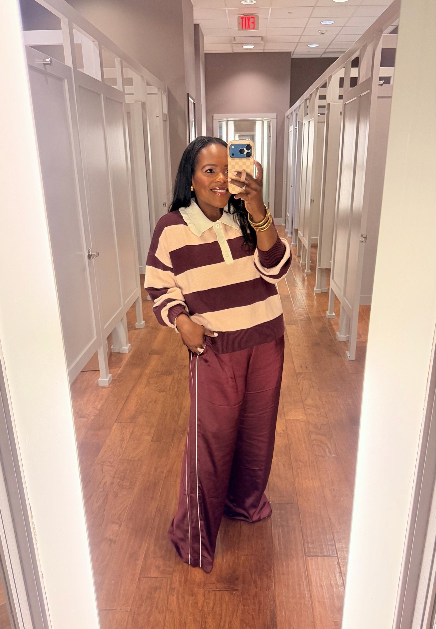 Satin track pants and ruffle collared rugby stripe sweater from LOFT! Wearing a large in each.

#LTKootd #LTKSaleAlert #LTKMidsize