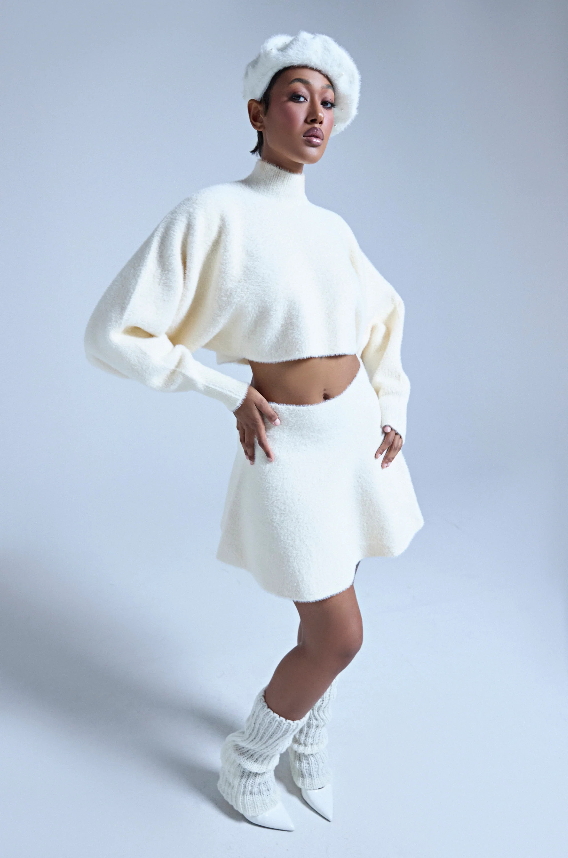 CUDDLE UP FUZZY MINI SKIRT IN IVORY | AKIRA