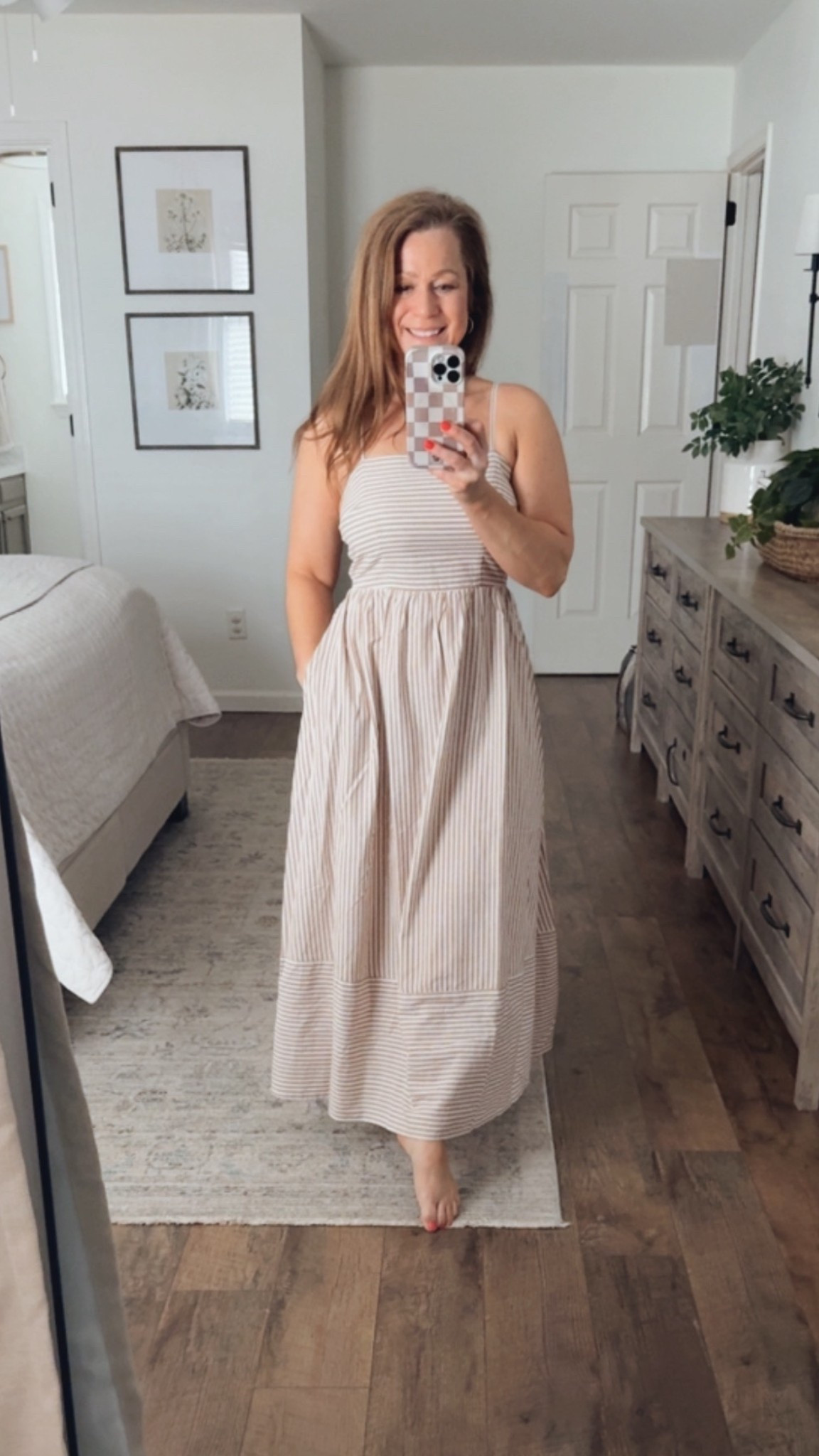 Maxi dress
Adjustable straps 
Smocked back detail with small back cutout 
4 colors 
Stripes or gingham pattern 

Perfect to wear alone or layered with a denim jacket or cardigan 

#LTKSeasonal #LTKmomlife #LTKMidsize