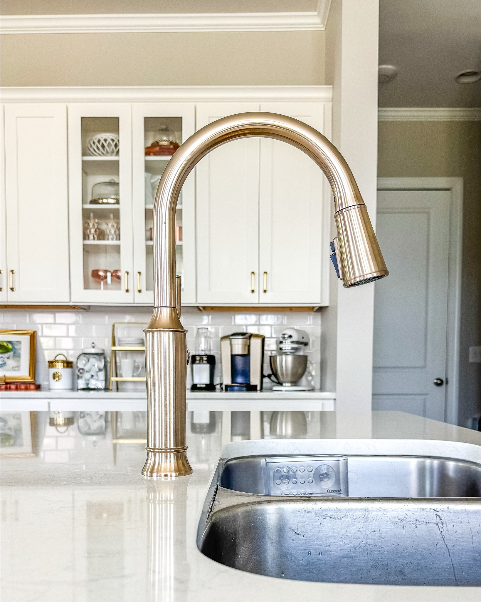 Give your kitchen an instant upgrade—no renovation required. A new brass kitchen faucet is one of the easiest ways to elevate your space, and this one from Wayfair delivers that warm, timeless look designers love. Prefer something a little more classic? The bridge faucet version (yes, with a pull-down sprayer!) is just as stunning and incredibly functional.

Don’t stop there—hardware makes a bigger impact than you think. Swapping outdated knobs and pulls for bin pulls and honey bronze finishes from Top Knobs instantly gives your cabinets that high-end, tailored feel. Small changes, major payoff. Literally.

If your kitchen is feeling tired, this is your sign—you don’t need a full gut to get a fresh, designer look. Start here. Stylish, simple, done. 😉

kitchen update, kitchen refresh, brass kitchen faucet, bridge faucet with sprayer, cabinet hardware upgrade, bin pulls, honey bronze cabinet pulls, top knobs hardware, wayfair kitchen finds, affordable kitchen upgrades, timeless kitchen design, interior design tips, easy home upgrades

#LTKHome #LTKSaleAlert