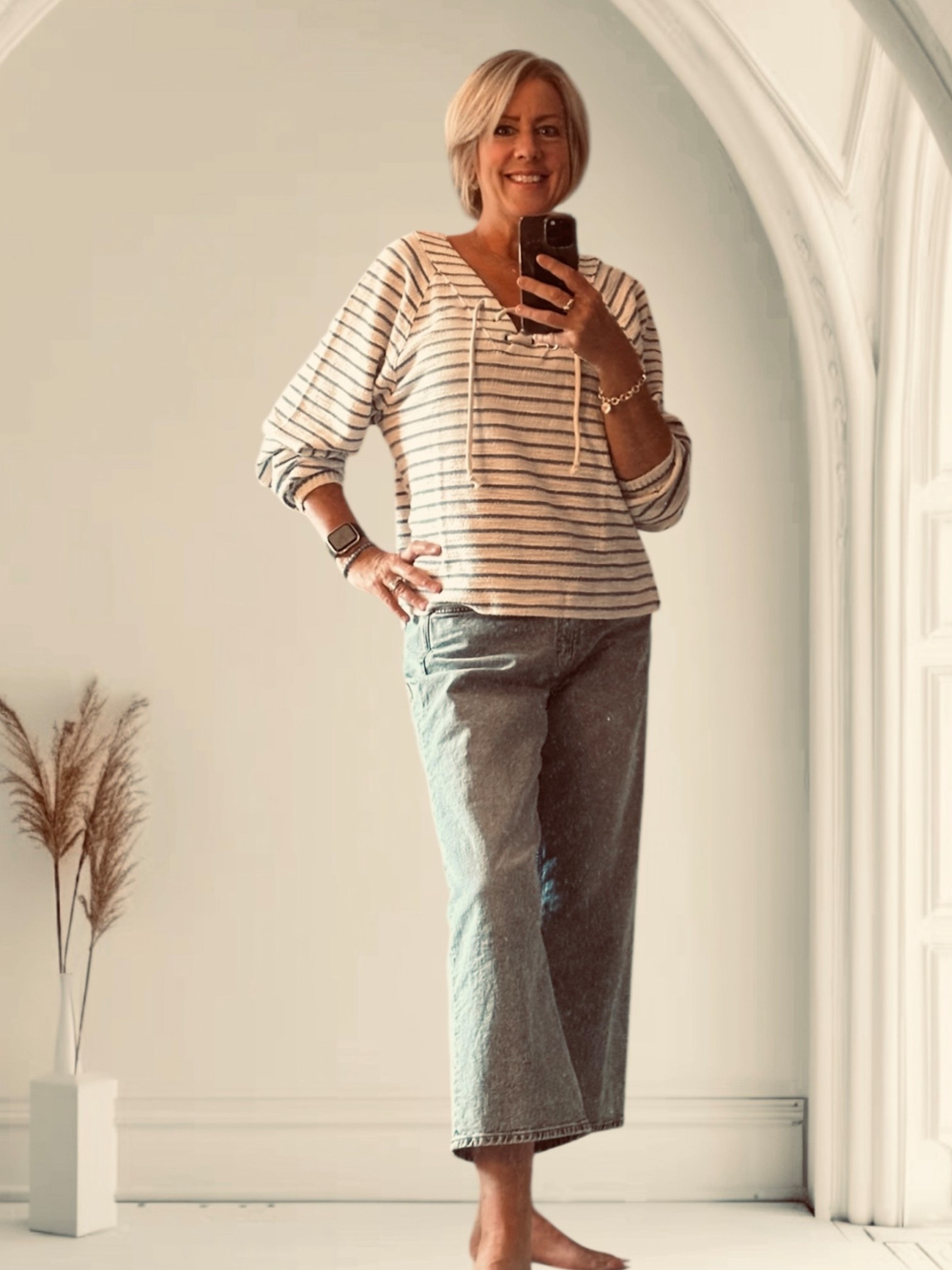 Happy Wednesday ! 

This beachy top will be your favorite for just lounging around in  this summer.
Its Terry / cotton  fabric is soft yet light and comfortable .  It has a lace up neck and is gathered in cuffs with elastic .   I bought a medium  which is what I would normally buy .   It has a boxy shape and is perfect and loose fitting , I think a large would be too big .   The stripes give it a nautical  vibe .   Perfect for cool summer evenings .  

The wide leg cropped denim jeans are also a favorite of mine this year .  Great casual ensemble with some slip on shoes or runners .   

Sweatshirt @aerie
Denim @hm

#blues
#stripes
#beachy
#vacation
#terrytowel
#babyblue
#fashionablesixties 
#may
#croppeddenim


#LTKover50style #LTKspring #LTKsummer