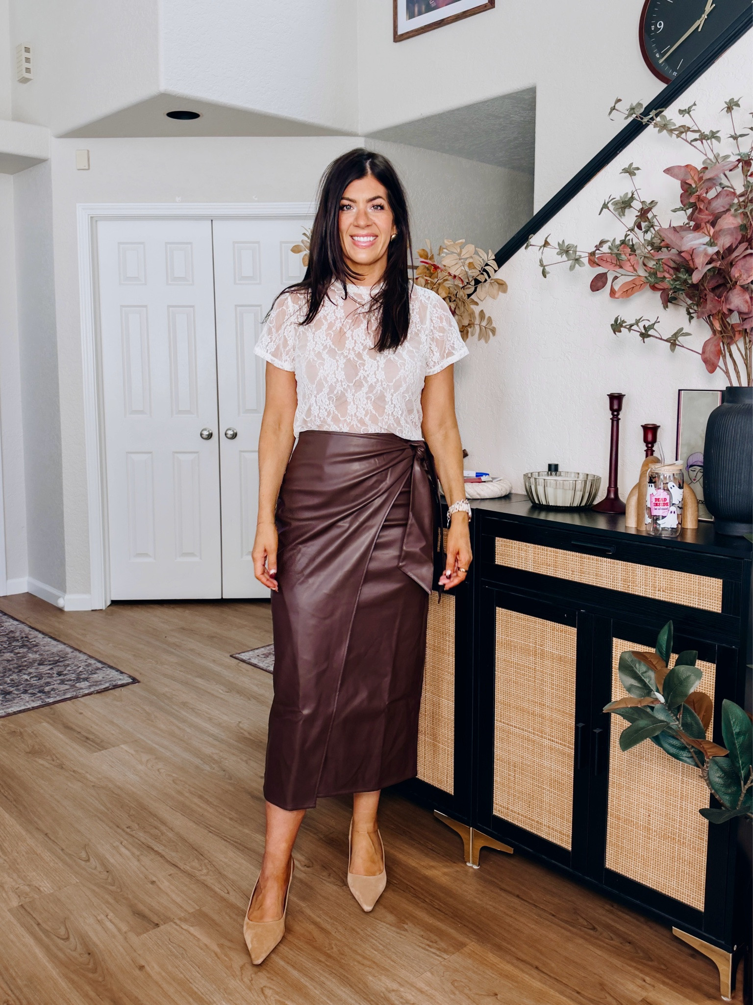 Fall fashion
Medium lace tee
Medium wrap faux leather skirt