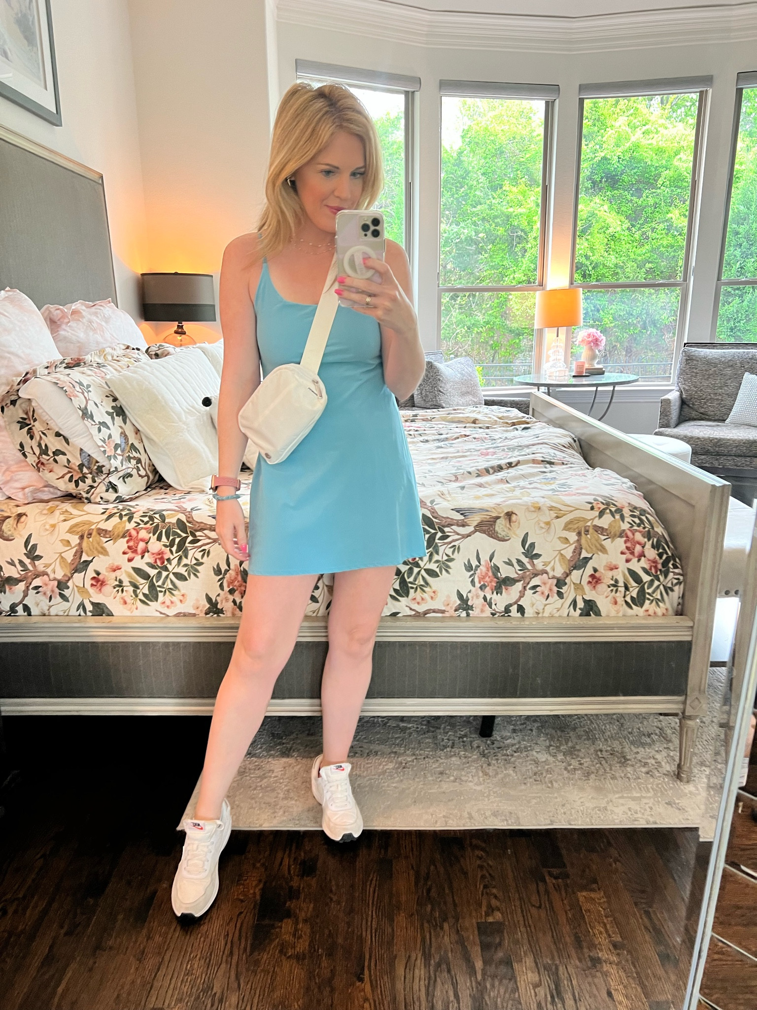 Abercrombie traveler mini dress 
Workout dress 
Casual dress with shorts 
Travel dress 
Comfortable travel look 
White Lululemon belt bag
White Nike sneakers 

#LTKsalealert #LTKfindsunder100 #LTKSeasonal