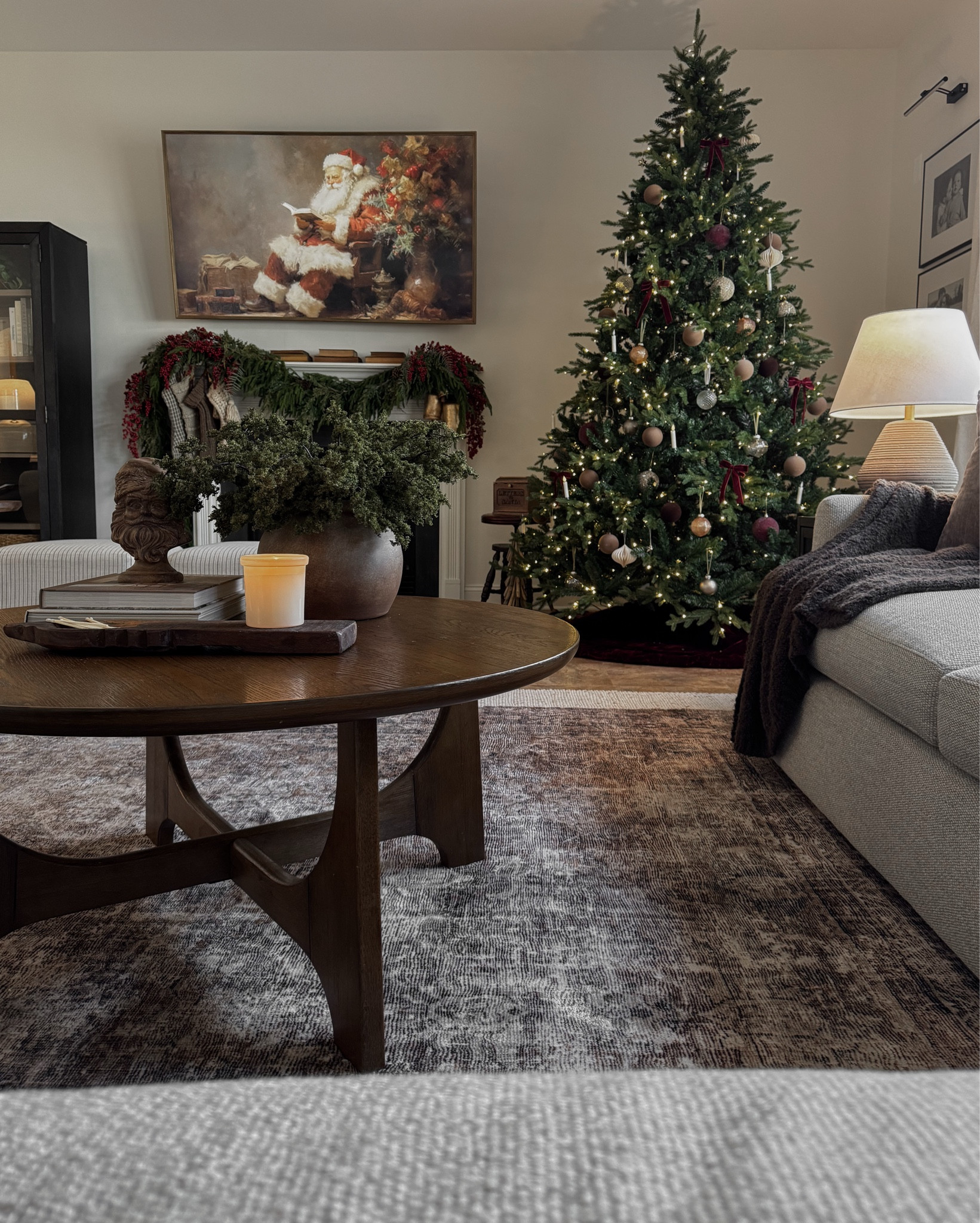 Moody living room, Christmas living room decor, Christmas tree, Christmas mantle, Christmas garland, coffee table decor, Christmas coffee table decor, round coffee table, sectional couch, layered rugs, living room rug, table lamps, accent chair

#LTKHoliday #LTKHome #LTKSeasonal