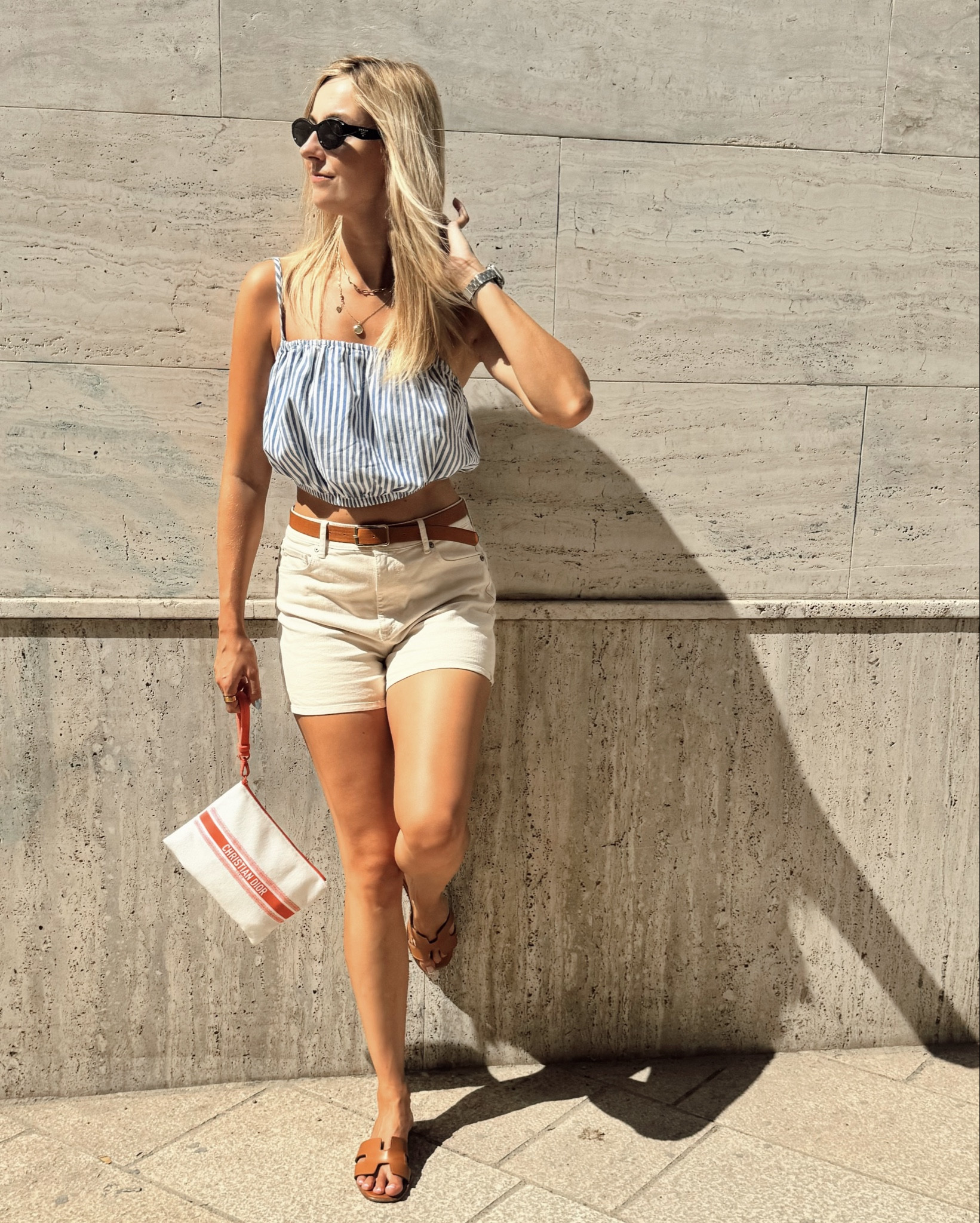 Euro summer outfit 

Beige shorts, summer shorts, striped top, summer top, brown slides, summer slides, Dior bag, Prada sunglasses, European summer, vacation outfit, Italy, coastal outfit 

#LTKFindsUnder50 #LTKTravel #LTKStyleTip