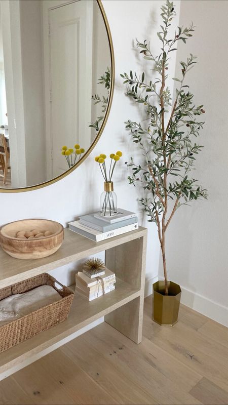 Home decor. Console table. Gold mirror. Faux olive tree. Coffee table books. Wooden bowl. Vase. Home style. Home refresh. 




#LTKsalealert #LTKstyletip #LTKhome