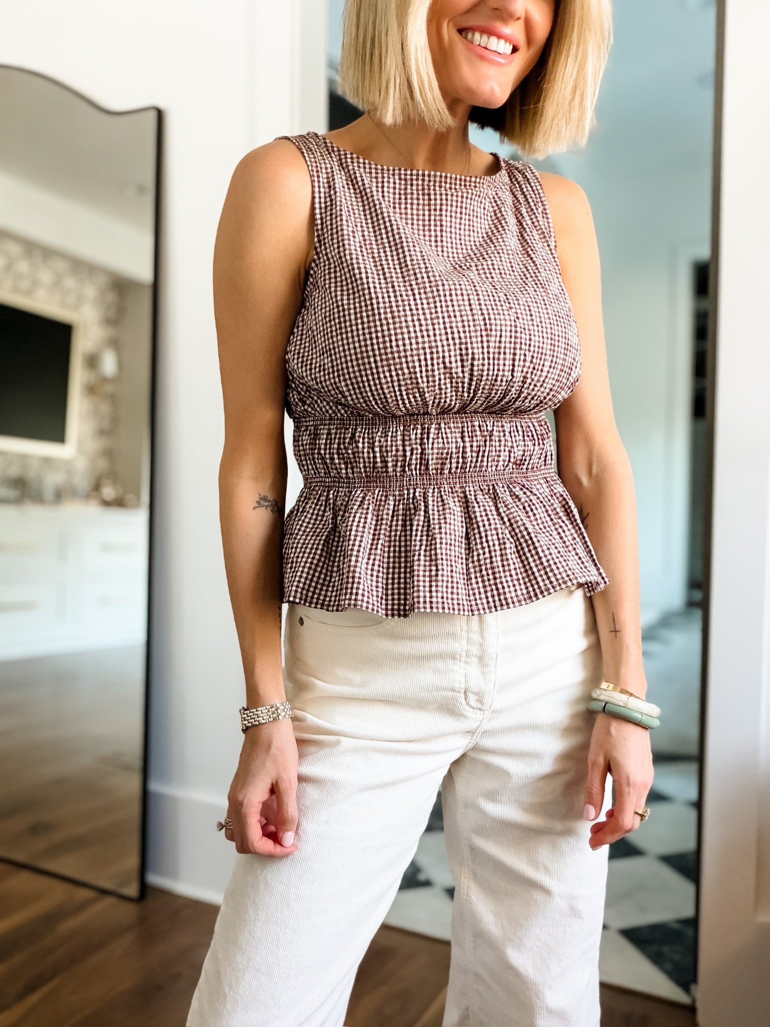 This gingham peplum top is so feminine and flattering! Pairing it with these corduroy pants from Target as well. The price point is unbeatable on this look! Wearing a  size S/4

Loverly grey, Target fashion finds, spring style finds, spring blouse 2026 outfit inspo 

#LTKmomlife #LTKSeasonal #LTKootd