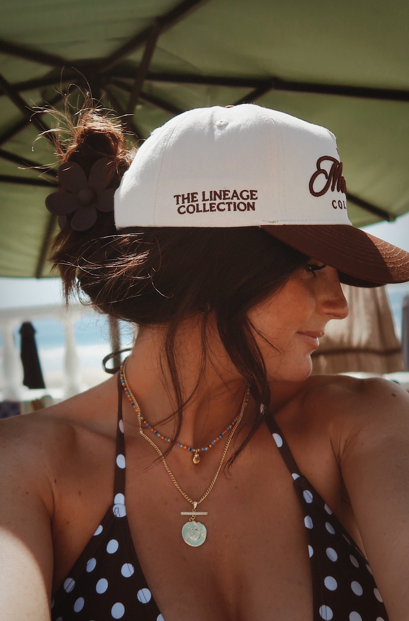 Beach accessories, brown trucker hat, brown flower clip, brown bikini 

#LTKBeauty #LTKSwim #LTKTravel