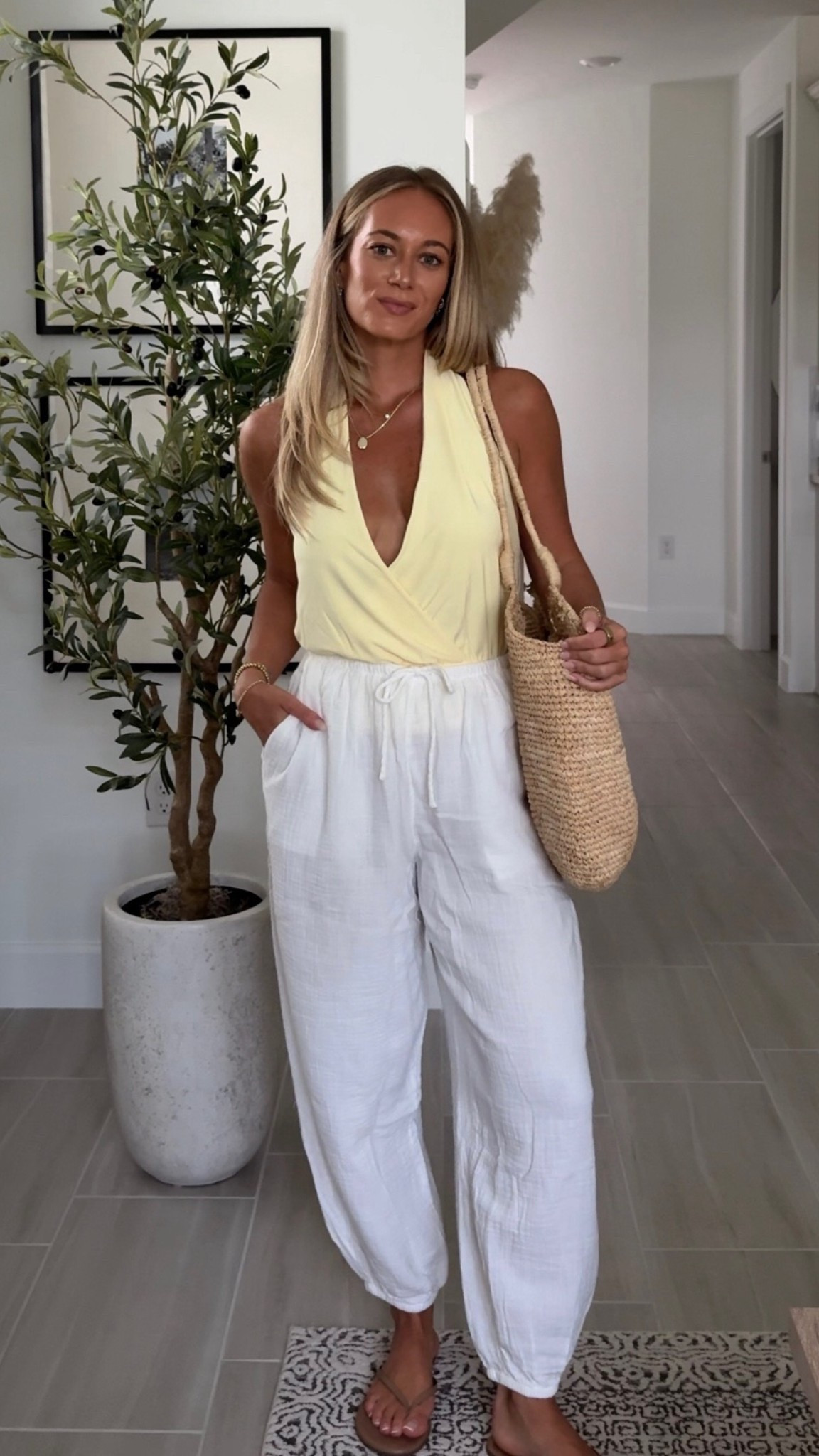 Styling my latest @Aritzia  haul, this butter yellow halter with these perfect shorts dressed up with a heel is the perfect summer going out look 

Wearing S in top and 6 in shorts 

linen shorts, halter top, yellow halter, summer going out outfit, dressed up shorts, shorts and heels, Aritzia outfit, elevated essentials, vacation outfit, date night outfit, summer outfit, outfit inspo

#LTKootd #LTKSeasonal #LTKTravel