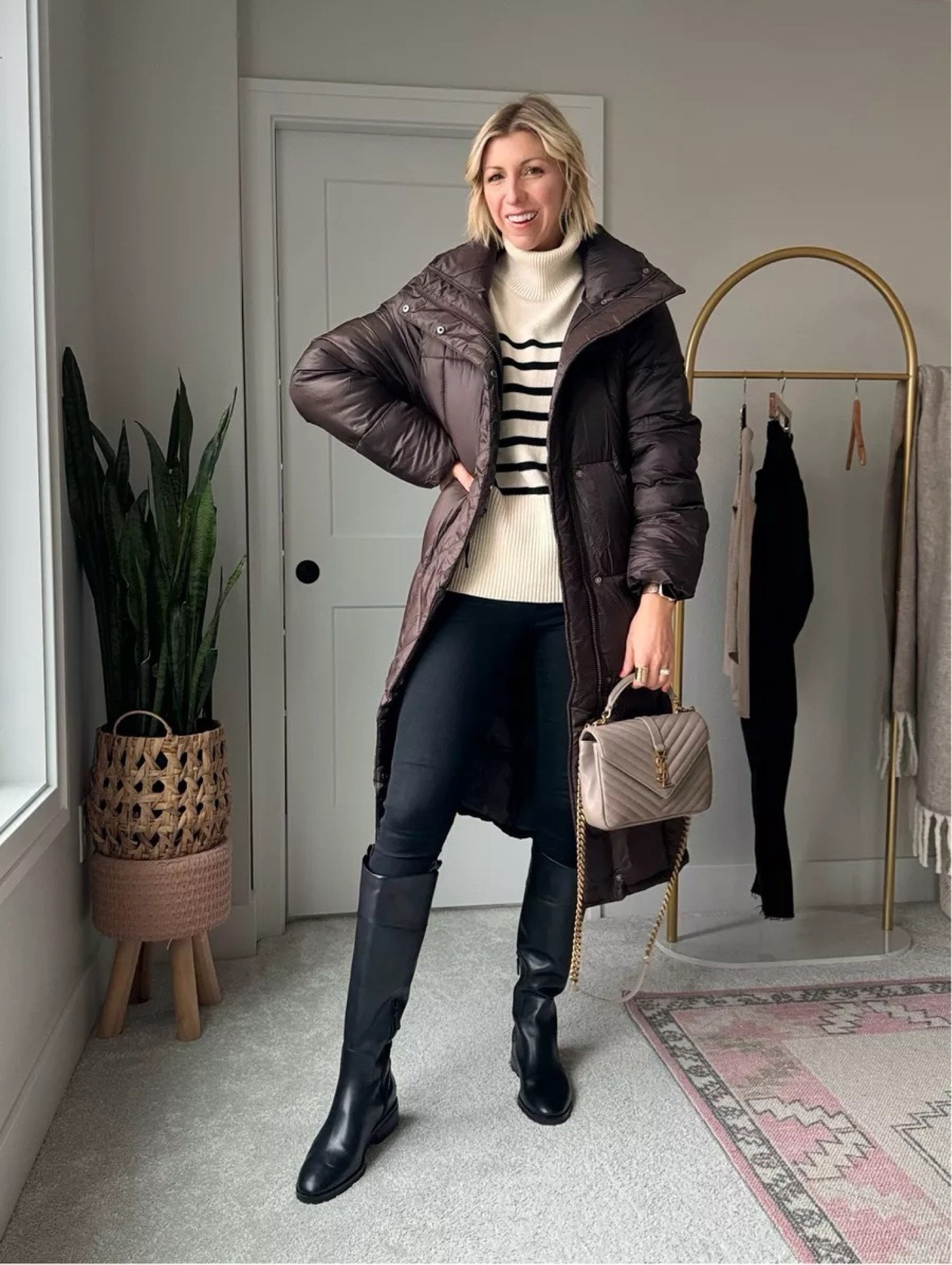 How to look modern in your skinny jeans in 2024! Black skinny, jeans, striped sweater, black, riding, boots, long, puffer coat, handbag

#LTKSeasonal #LTKover40 #LTKstyletip