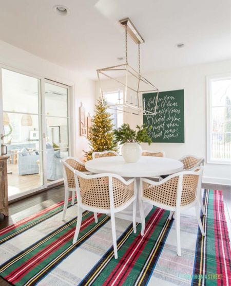 I love how some simple decor switches can transform a room into another season! Our dining room is decorated with a round dining room table, cane chairs, a linear chandelier, Christmas wall art and my fave faux real-touch Christmas tree! Our cane chairs and plaid rug are out of stock, but I've linked other options!

home decor ideas, simple home decor, holiday decor, holiday finds, christmas finds, christmas decor, dining room decor, christmas dining room, seasonal decor, pb inspired, serena and lily inspired, kitchen table decor, dining room table, wall decor, coastal design, amazon finds, amazon home

#LTKstyletip #LTKHoliday #LTKSeasonal #LTKhome