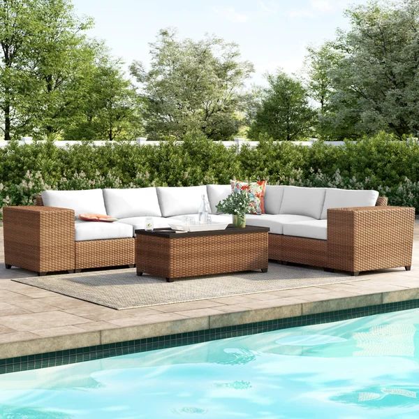 Waterbury 9 Piece Rattan Sectional Seating Group with Cushions | Wayfair Professional