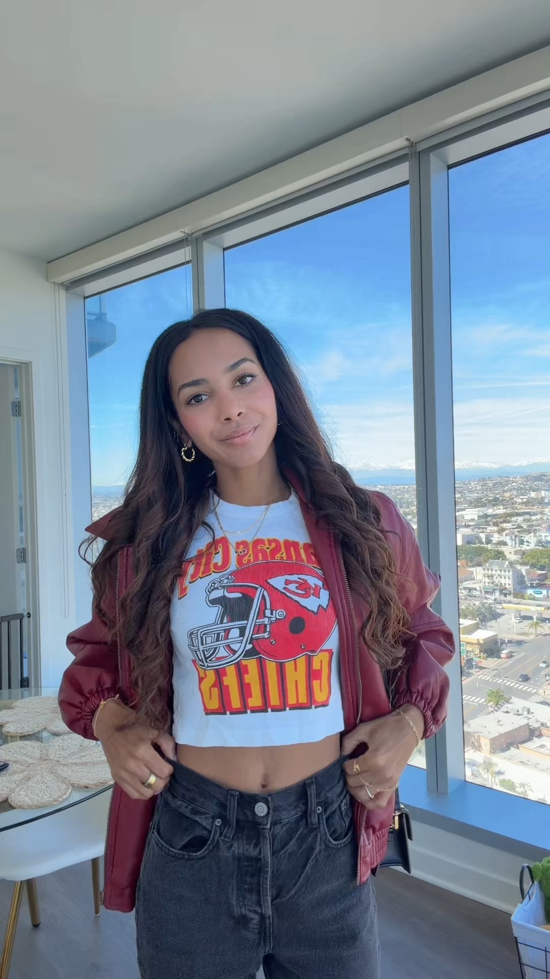 Baby shower theme was sporty chic ❤️🏈

Went for my favorite baby tee Kansas City chiefs, black dad jeans from Pacsun, a cozy red leather jacket from Edikted, & ballet flats which are super comfortable from @abercrombie ! 

Top: XS
Jacket: XS 
Jeans: 22