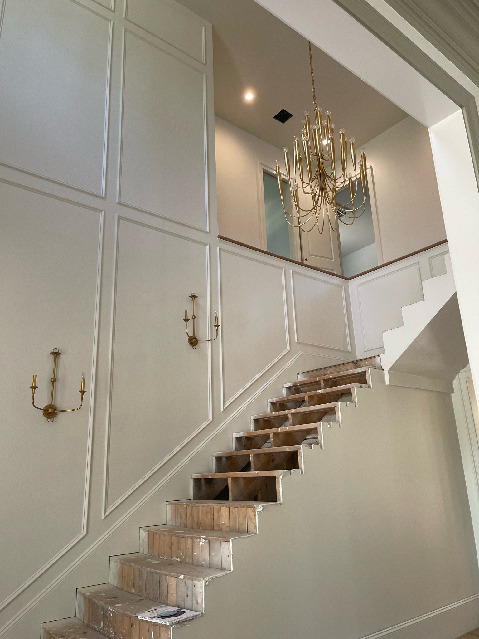 I love how our stairway lighting turned out! #homedecor #lighting #interiordesign #sconce #chandelier 

#LTKHome