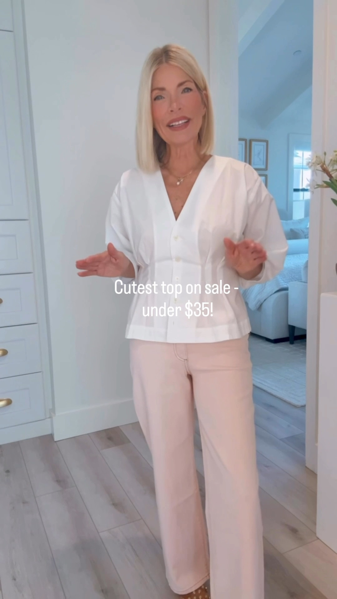 My adorable top is on sale under $35 and all sizes are still in stock.👏🏼 It runs large so you can size down. I’m wearing an XS  Petite. 
My new blush high waist jeans are the perfect soft blush color and there’s no front pocket which gives them a clean seamless look. I’m wearing a size 25 and I’m 5’4”. 

Wearing my favorite pearl slides. These are so comfortable and go with everything.🤍
Size down a size as they run large. 

#LTKootd #LTKSaleAlert #LTKOver40