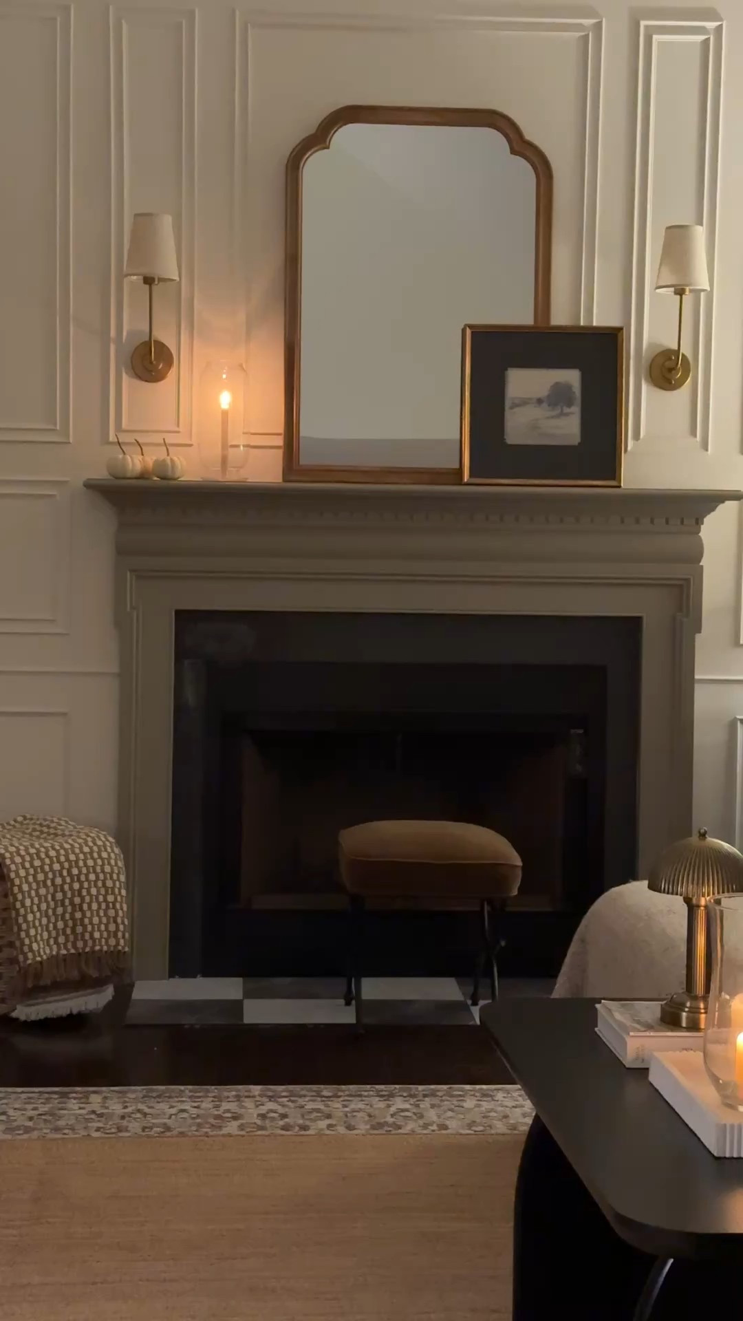 All is calm and bright in our cozy living room! We put up box moulding and hung sconces, added a  mirror and art.  Shop below.  Lots on sale! 

Lamps
Cone lamp shade
Wall art
Large mirror
Velvet bench
Gold Sconces 
Throw blanket
Box moulding 
Wall trim
Coffee table
Coffee table book
Hurricane candle

#LTKHome #LTKHoliday #LTKSeasonal