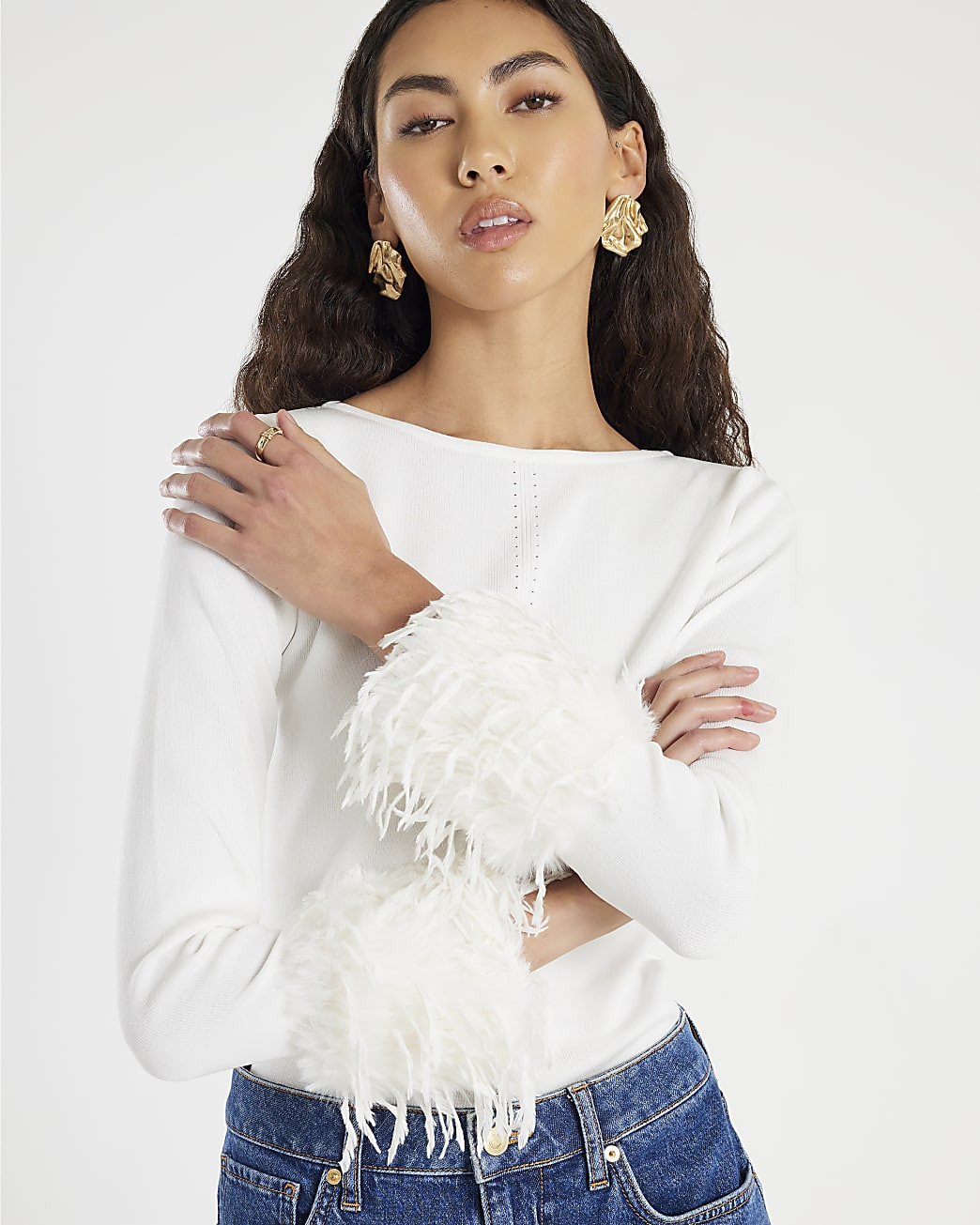 Cream Knitted Slash Neck Feather Cuff Top | River Island UK & IE