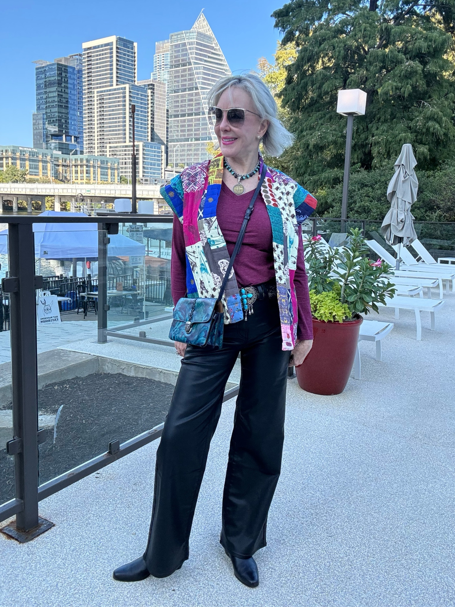 Sleeveless quilted patchwork puffer vest with cap sleeve 
High rise coated flare jeans
Gucci sunglasses 
Veronica Beard black leather slip on booties has been my best investment this falll