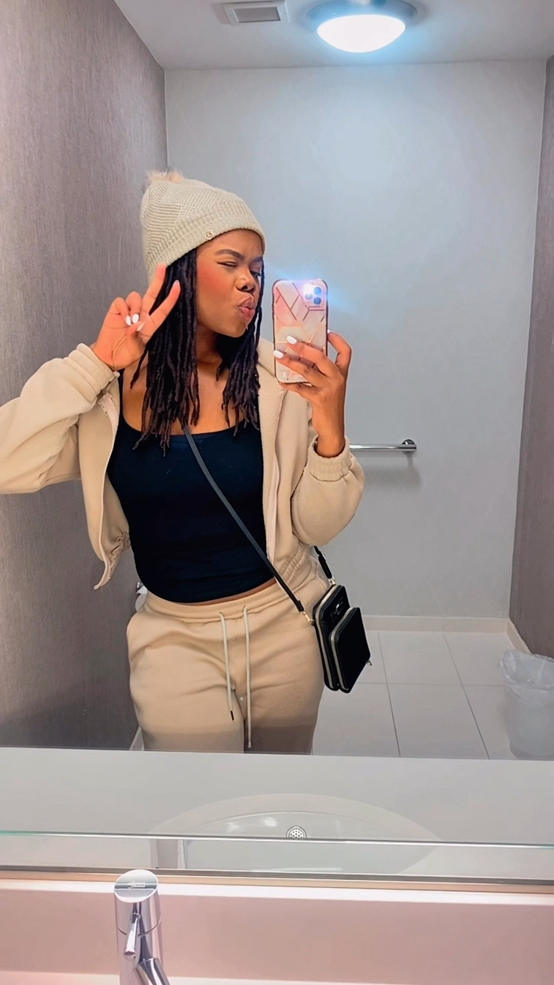 Cozy fall outfit, beanie with sweatsuit and long sleeve black top🖤

#LTKStyleTip #LTKTravel