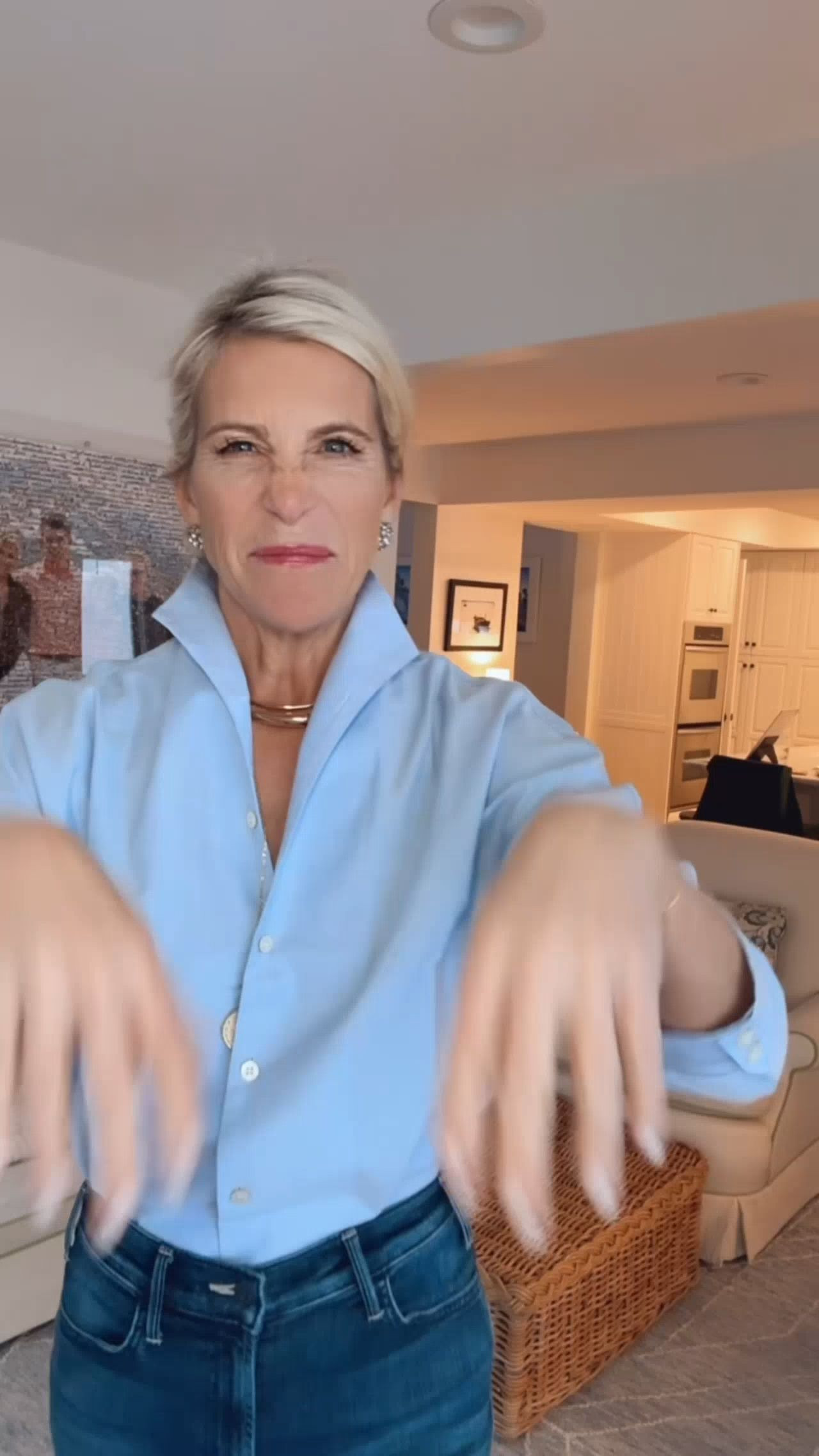 The only blue button down you need right now.  Paired with the "viral jeans' that fit everyone, my best Madewell clogs, Jane Win Jewlery, my gorgeous white Quince coat and my new brown and red suede tote.   

 #LTKootd #LTKOver40 #LTKTravel