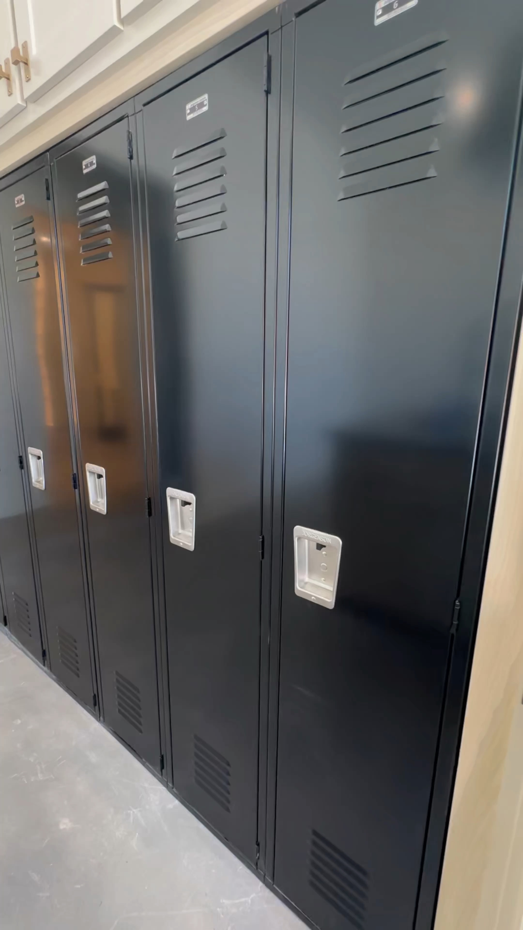 Metal lockers for the win! We had traditional “school” metal lockers in our last house and we knew we had to do it again! Perfect for all kinds of storage….and durable enough to withstand the storm of boys running through the house 🖤 

#LTKVideo #LTKhome #LTKfamily
