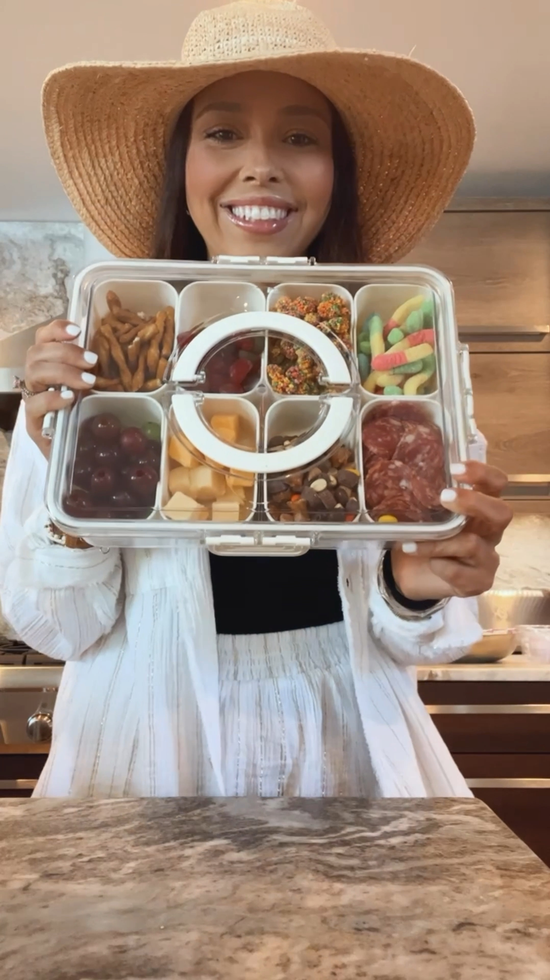 My first snackle box of 2024! LOVE the size, storage, and convenience of this container + the handles fold down to easily fit into your cooler! 

#LTKSeasonal #LTKGiftGuide #LTKSummerSales