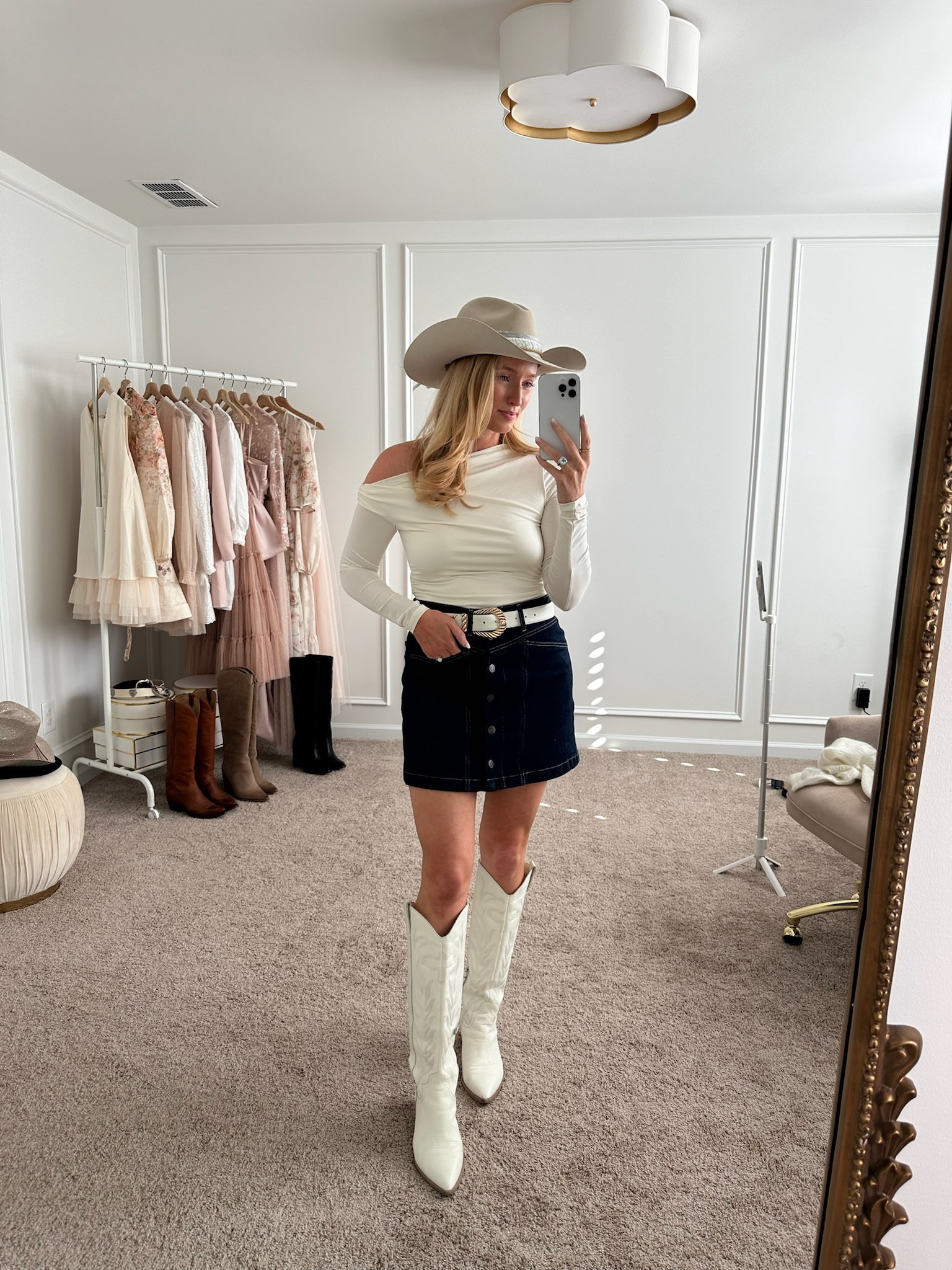 The cutest western outfit! Would be perfect for a country concert! Wearing size small in the top and 28 in the skirt. Fall outfits // western outfits // concert outfits // western boots // denim skirts 

#LTKSeasonal #LTKStyleTip