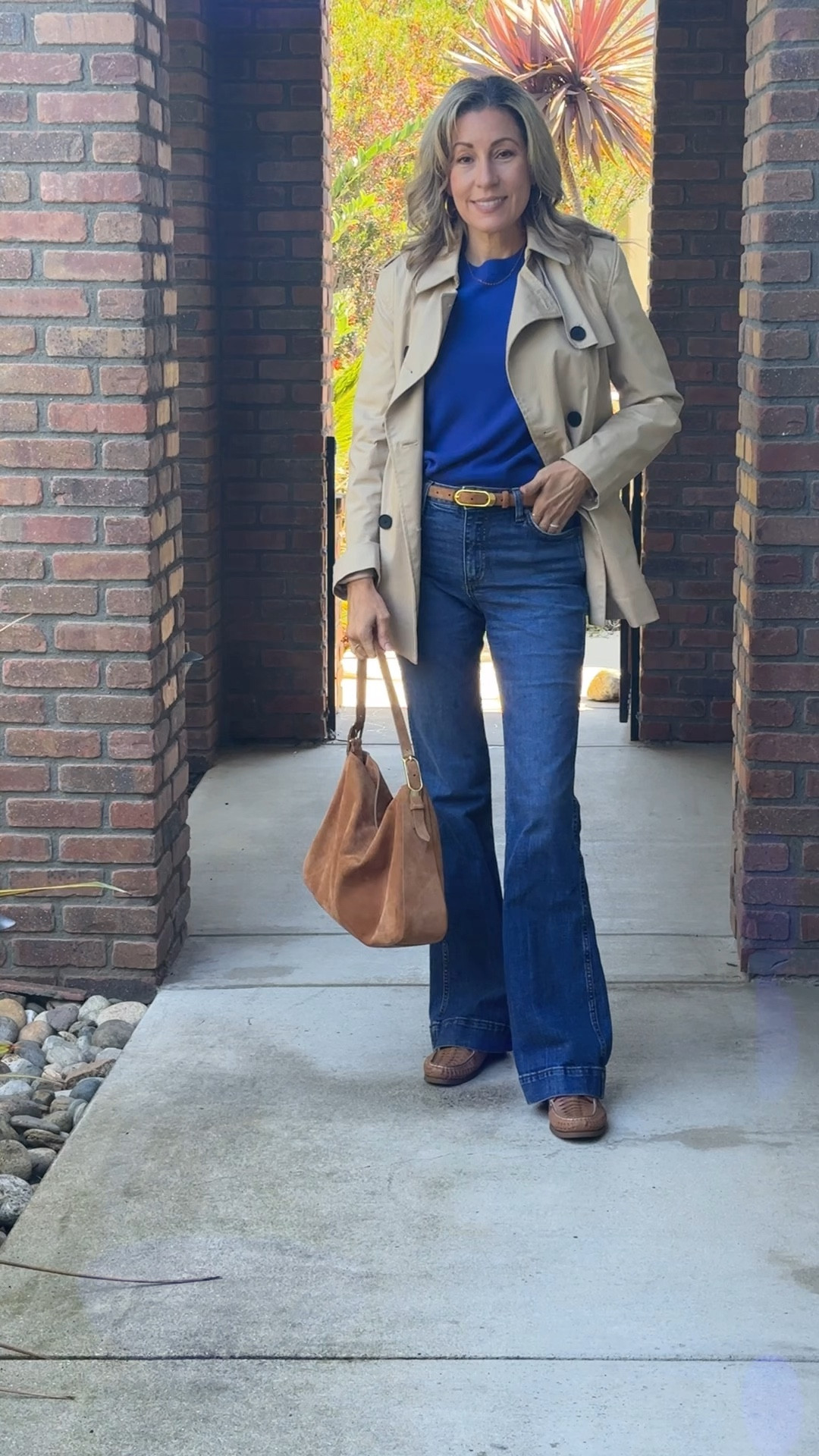 Cashmere feels and timeless style 🤍 I paired this luxe blue cashmere sweater with dark-wash flares, a trench, and a soft suede tote for an effortless, polished look that works from coffee runs to dinner out.

Shop this full outfit and more elevated everyday staples on my LTK 🛍️
#FallStyle #OOTD #LTKFall #FashionOver40 #CashmereSweater #ClassicStyle #StylishAndGrateful

#LTKItBag #LTKSeasonal #LTKOver40