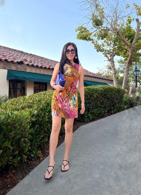 I’m enjoying the temporary cool down before it heats up this weekend! For a casual day out, I wore this multicolor mini shift dress with my purple Proenza Schouler clutch, black strap sandals and gold butterfly hoop earrings.

#LTKunder100 #LTKSeasonal #LTKitbag