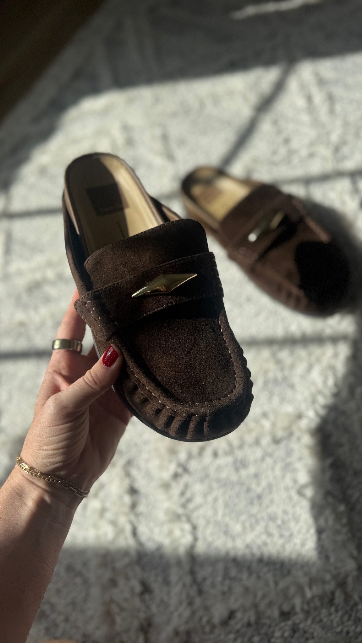 How pretty are these chocolate brown loafers with gold hardware!
