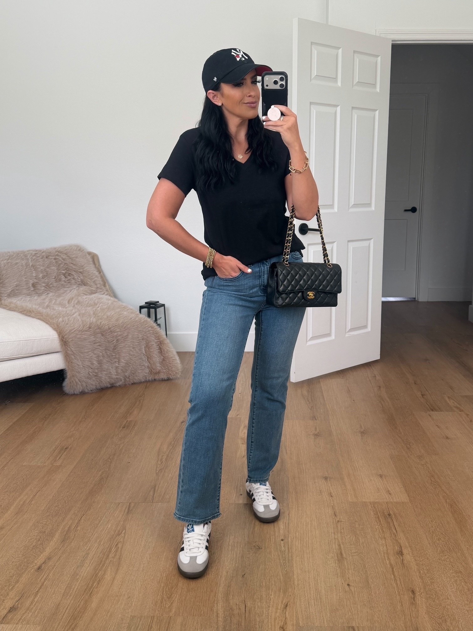 Quince 100% Organic Cotton Slub V-Neck Tee wearing size medium only $19. Quince Bella Stretch Straight Jeans wearing size 27 only $50. 
