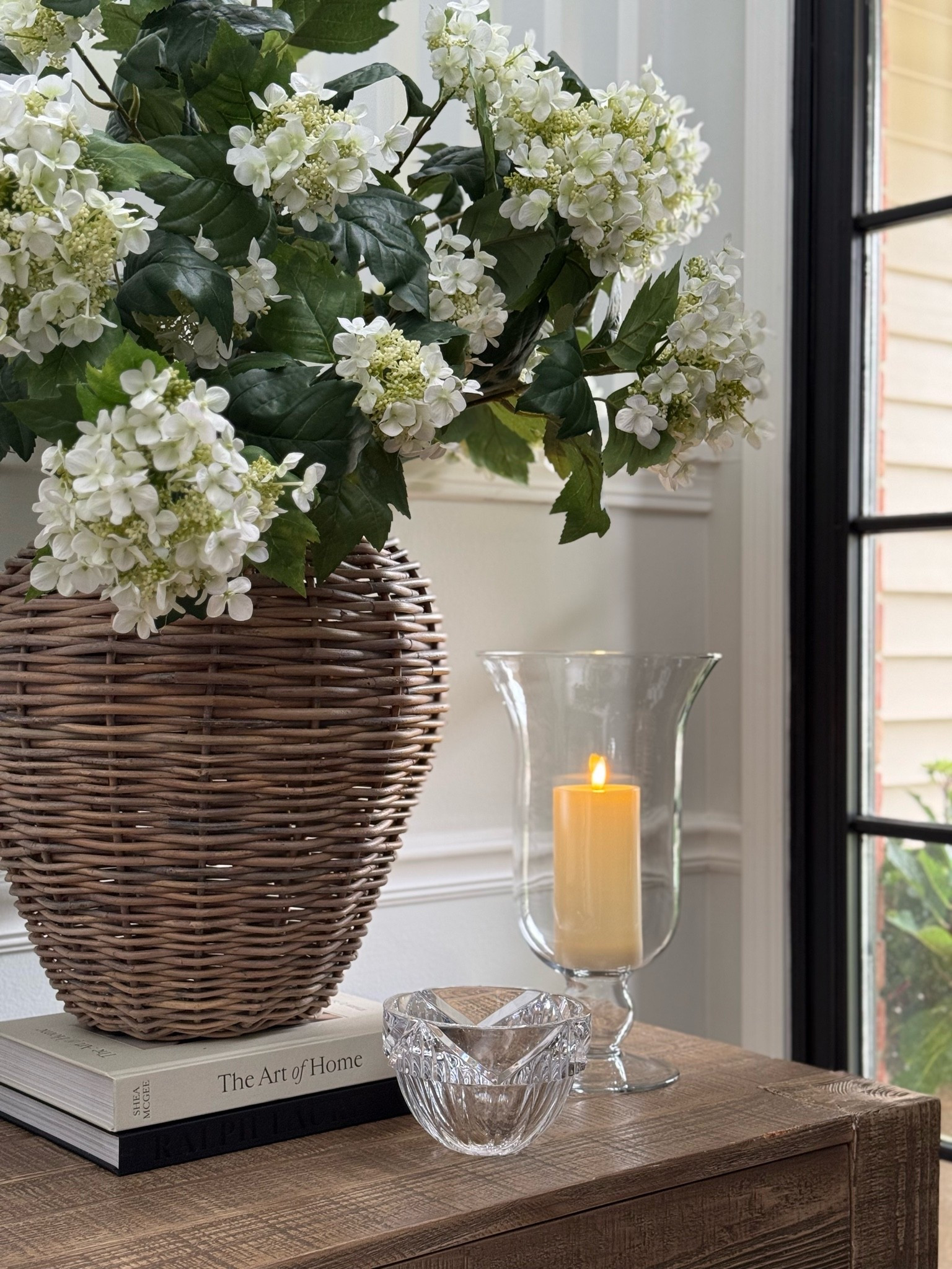The best $30 I’ve spent lately! This footed glass vase is perfect for flowers or as I’m currently using with a faux candle. My faux hydrangeas are currently on sale.

#LTKSeasonal #LTKHome #LTKSaleAlert
