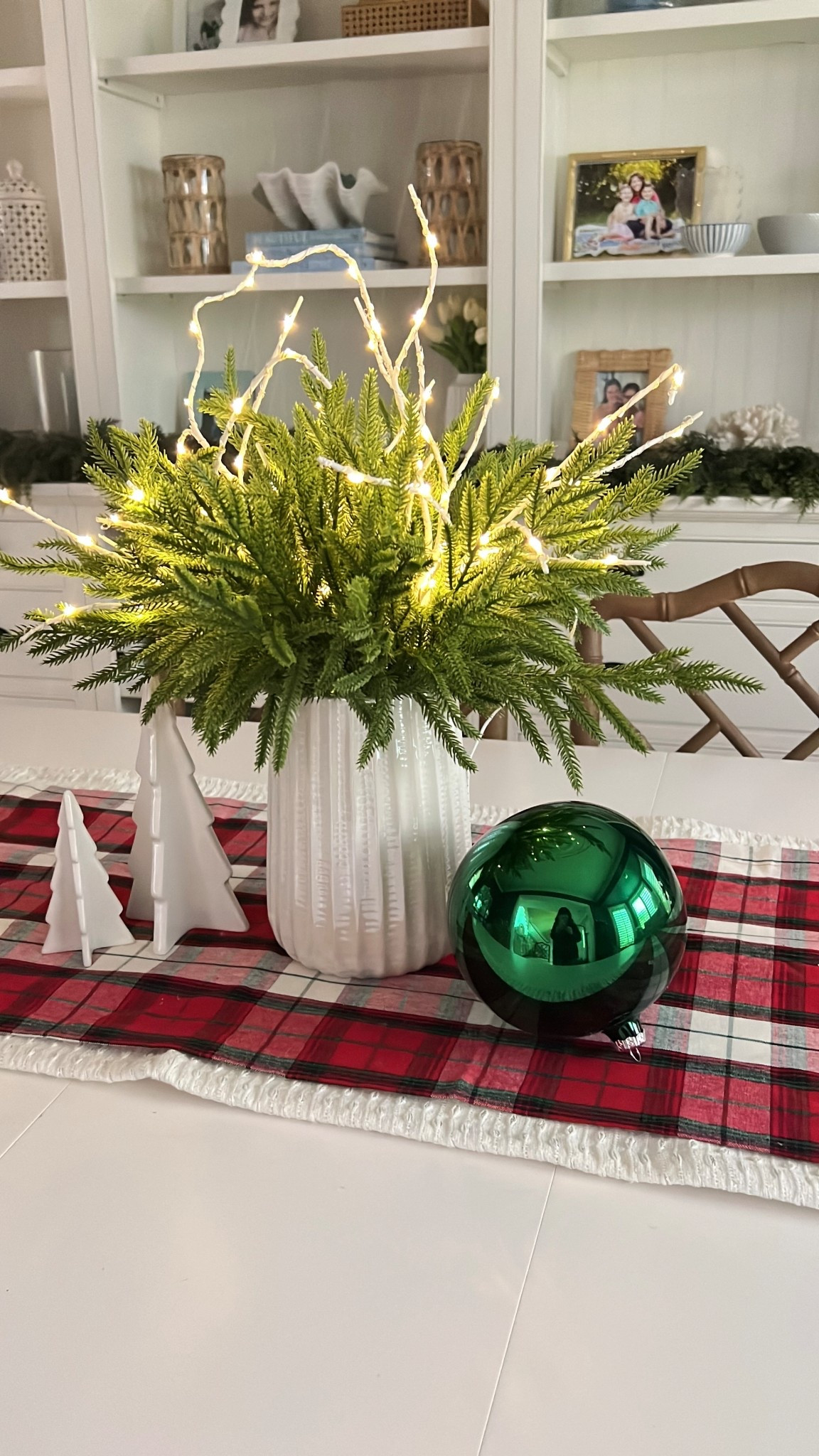 The holiday tablescape is officially set! Time to gather this tartan table runner, some small Christmas tree decor pieces, and faux greenery.

table setting, hosting tips, entertaining at home, decorating hacks, winter season, christmas ornaments, DIY decor, dining table inspo

#LTKFindsUnder50 #LTKSeasonal #LTKHome