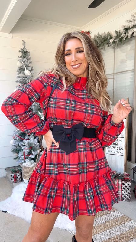 Red tartan plaid Christmas dress | holiday party outfit | black bow belt | black boots 

#LTKVideo #LTKparties #LTKHoliday