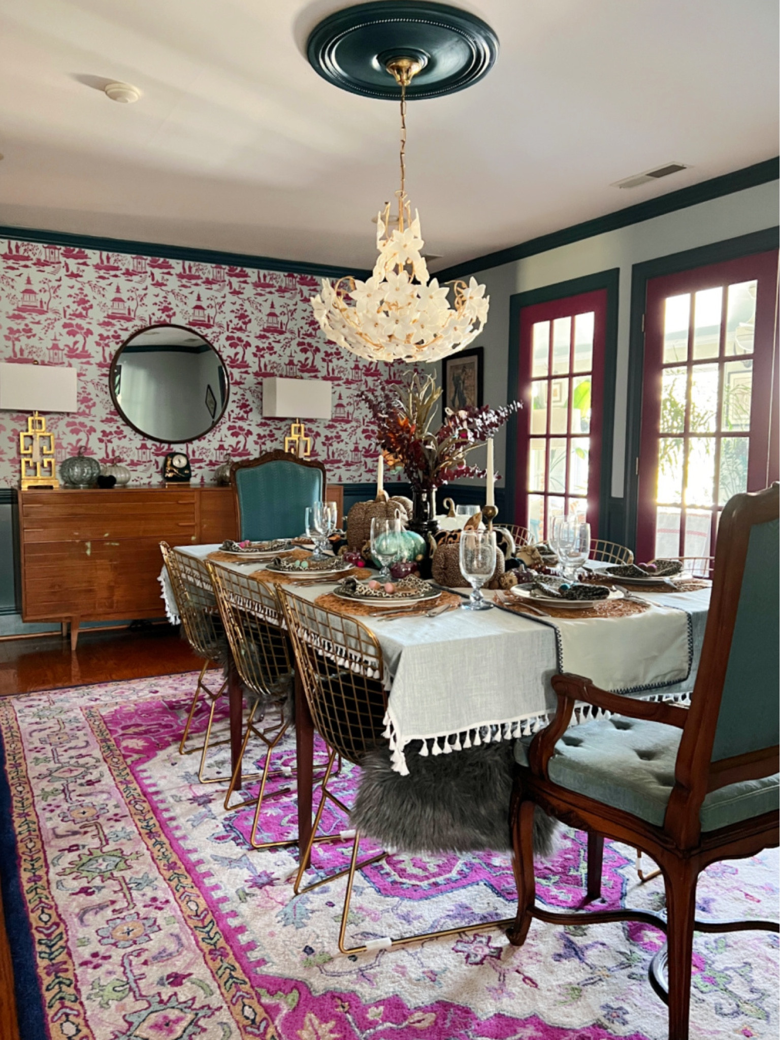 Dining room, mid century buffet, pink rug, gold dining chairs, flower chandelier, round mirror, Greek key lamp, gold lamp, mid century mix

#LTKhome