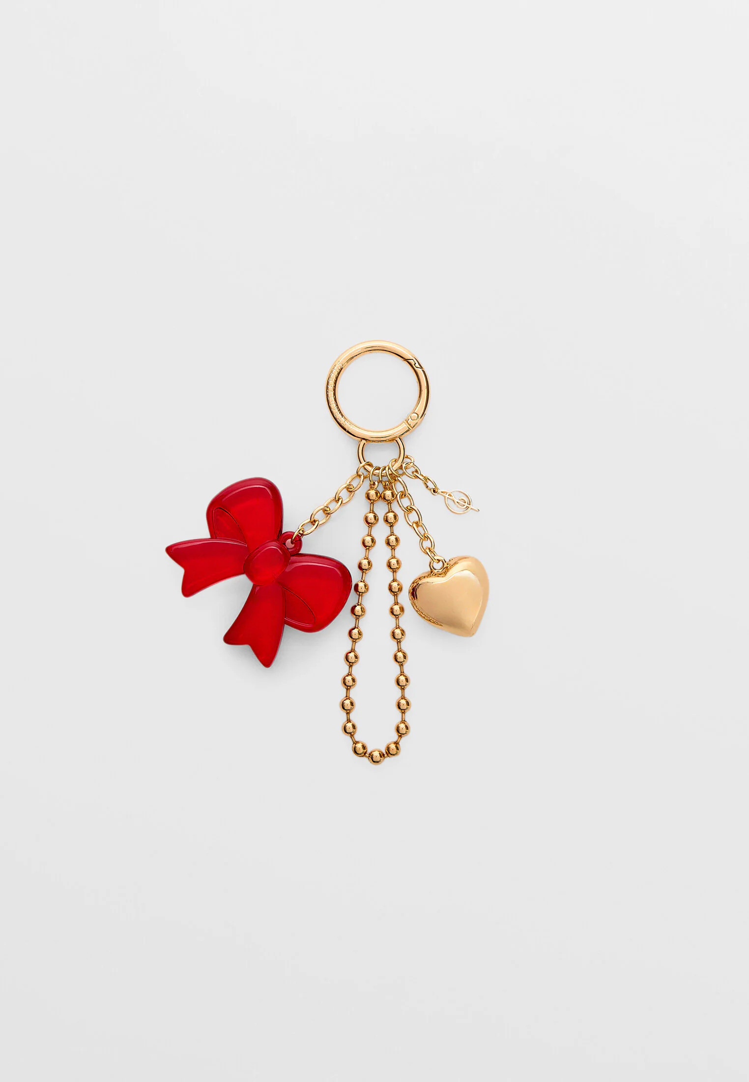 Bow and charm key ring | Stradivarius (UK)