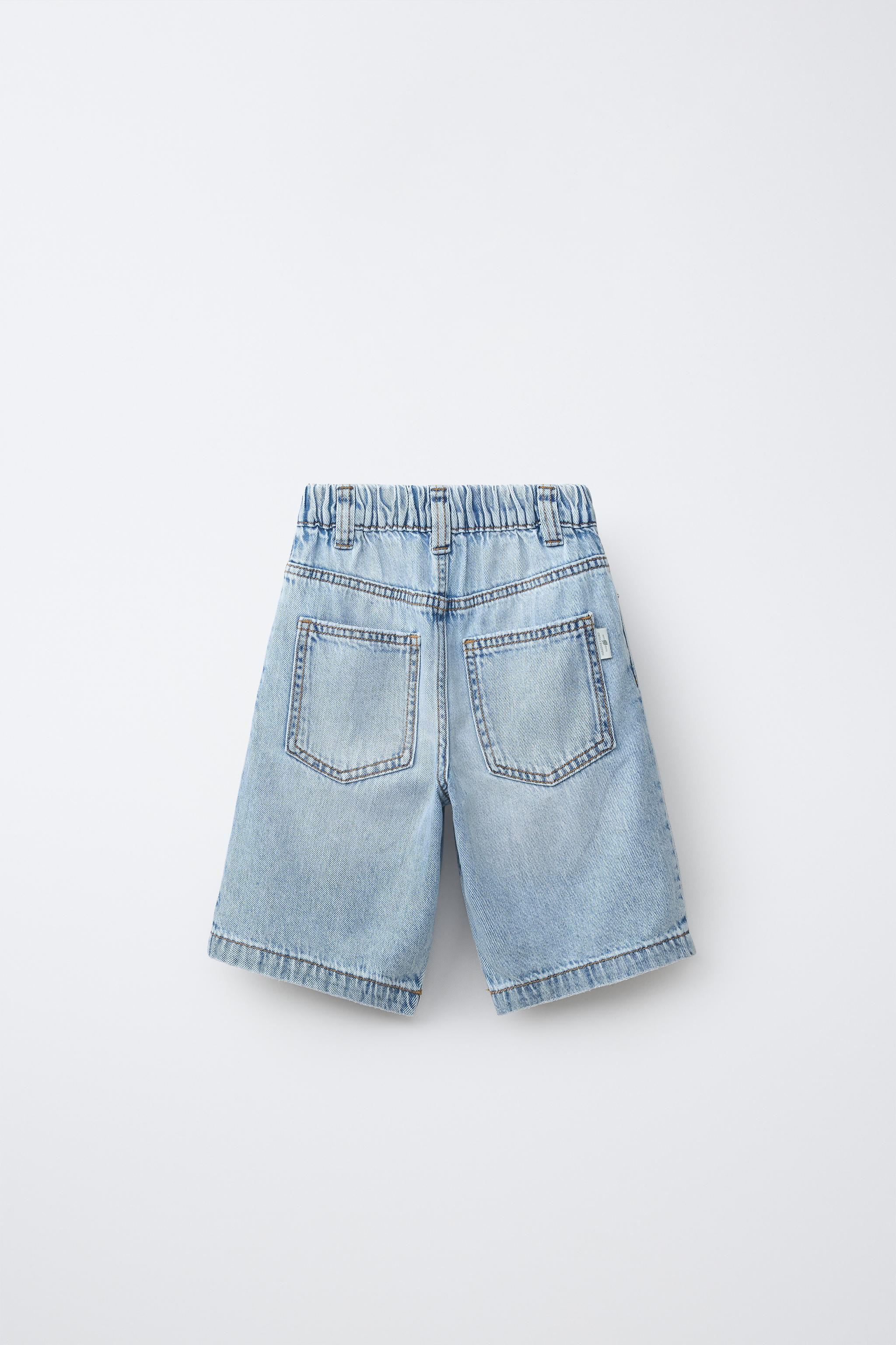Baggy denim shorts with elasticized waistband and front button closure. Front pockets and back pa... | Zara US