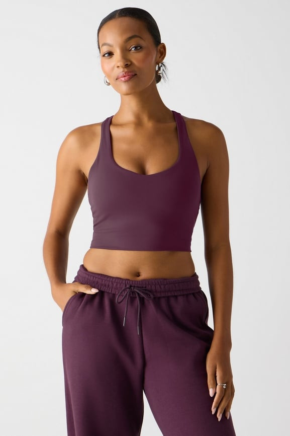 Haut court avec brassière intégrée Anywhere | Fabletics Europe