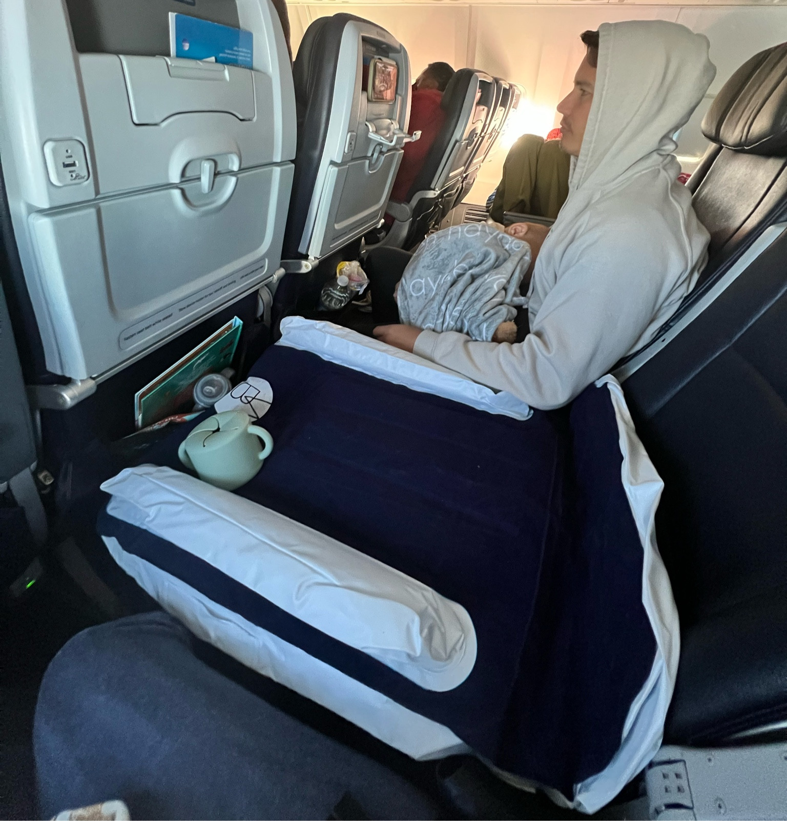 Toddler airplane bed was a MUST! Inflated and deflated fast, came in a small drawstring bag.

#LTKkids #LTKGiftGuide #LTKtravel