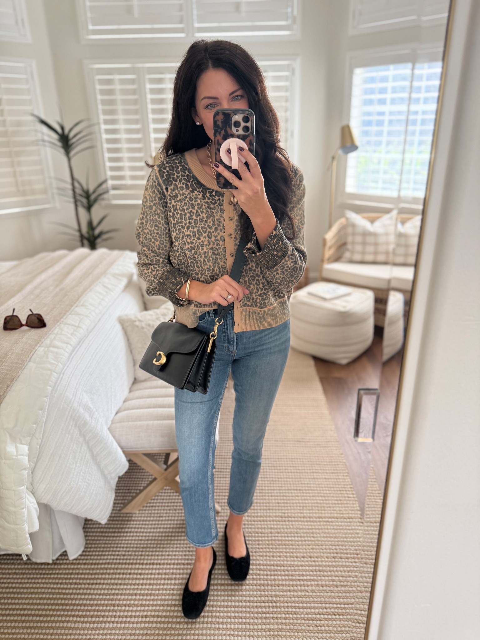 Amazon leopard cardigan on sale and back on prime! Wearing the color dark brown in a large

#LTKSaleAlert #LTKootd #LTKFindsUnder50