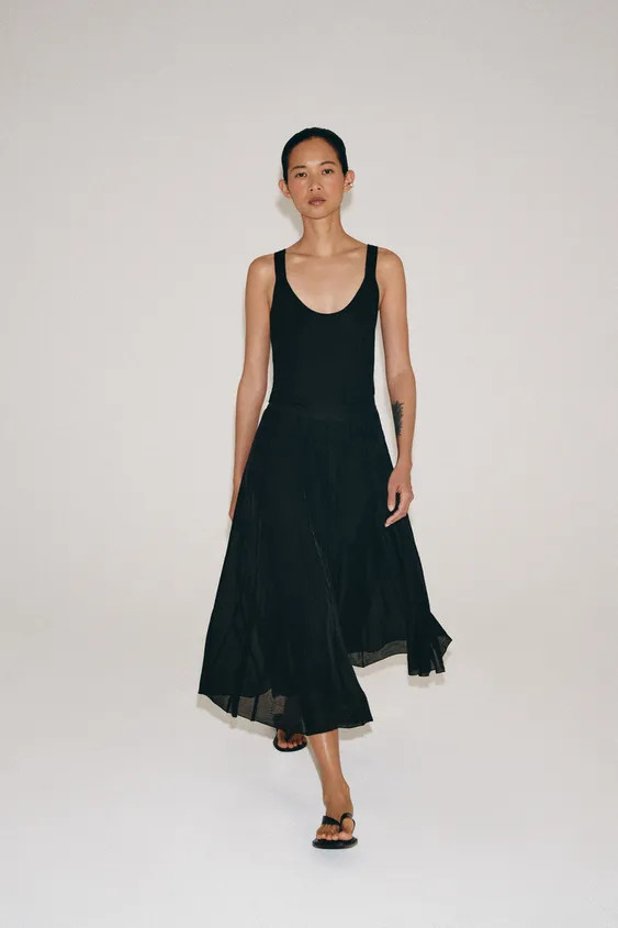 ZARA WOMAN COLLECTIONMid-rise midi skirt made from a lyocell blend. A-line hem. Tonal interior li... | Zara US