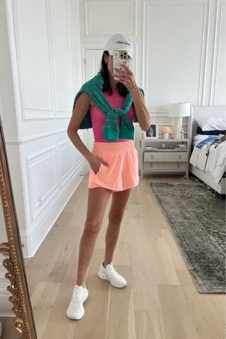 Casual Athleisure mom look 🩷 loving all the bright color for spring! These neon workout shorts are so cute & comfy I got them in multiple colors.  Wearing my go to white oncloud sneakers for errands or the gym🫶🏼

I’m wearing size small in the shorts. Sneakers run TTS. 

Athleisure outfit, spring outfit, workout shorts, mom style, casual style, running shorts, colorful outfit, summer outfit, vacation outfit, school drop off outfit, oncloud sneakers, white sneakers, striped sweater, Walmart, Christine Andrew 

#LTKfindsunder50 #LTKfitness #LTKstyletip