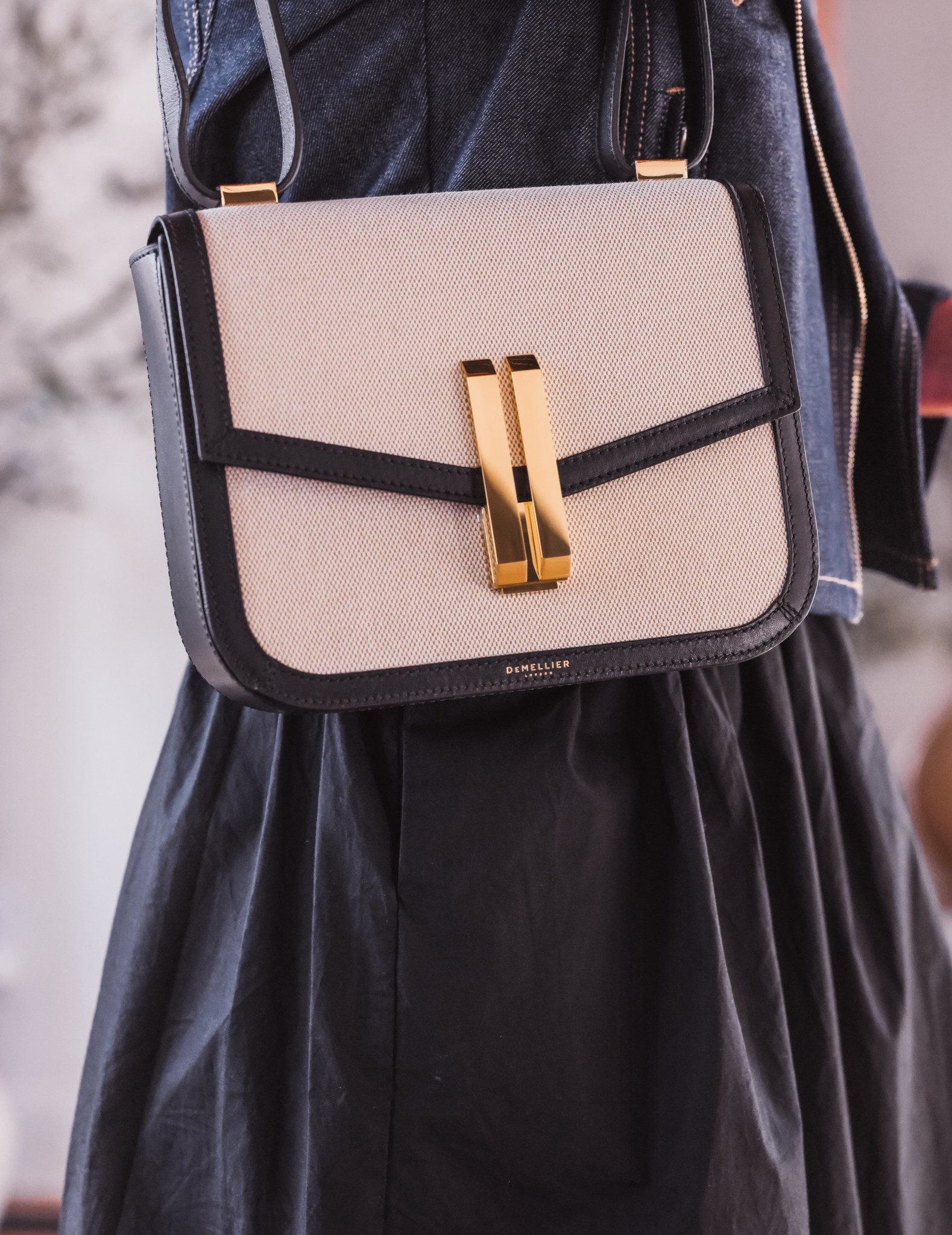 I love this canvas and leather Demellier convertible handbag. It can be worn as either a shoulder bag or crossbody. 

#LTKItBag #LTKSeasonal