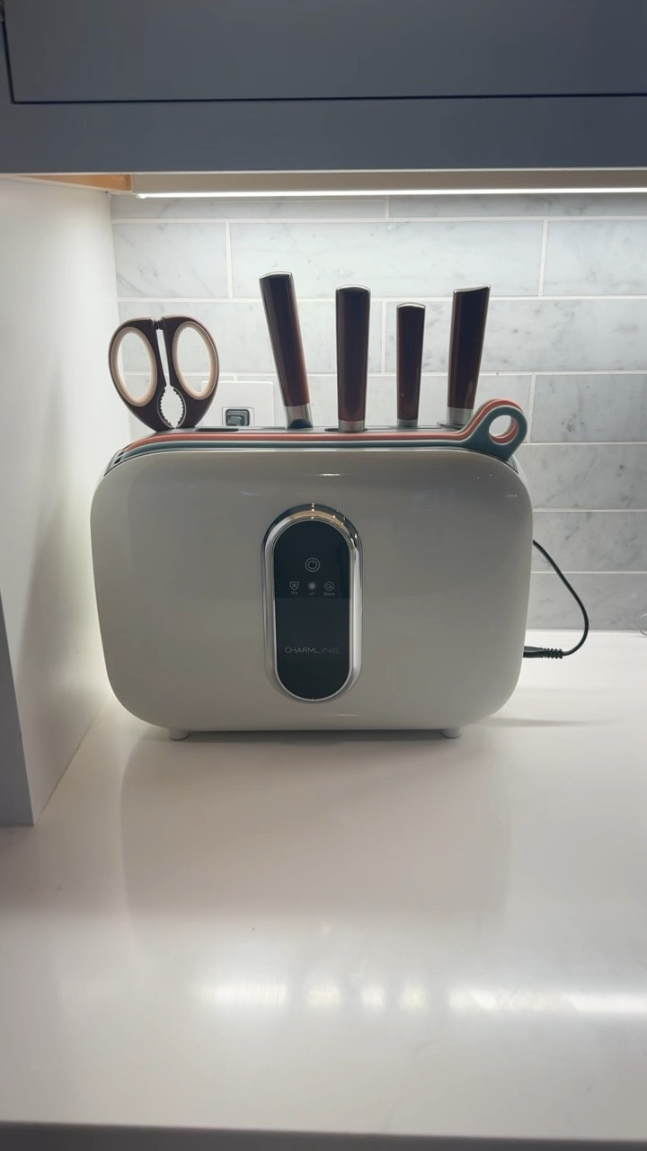 Smart Cutting Board: After using the cutting board set and knife, simply wash them and place them on the holder. With just a click of a button, the holder will automatically enter a timed drying mode, ensuring that your cutting boards and knives remain clean and dry.
3 Color-Coded Chopping Boards: Each cutting board is specifically designed for different types of food. For instance, the cutting board for fish has a non-slip surface. Color-Coded index are present on the boards, indicating which food type they should be used for, whether it's raw meat, raw fish, vegetables, or cooked food.
4 Knives for Various Purposes: Our set includes four different types of knives tailored to handle various foods, along with a pair of scissors and a sharpener.
Cutting Board Organizers and Storage: Experience the convenience of organized placement for your cutting boards and knives, allowing them to dry and stay clean. The knives and cutting boards are also dishwasher safe.

#LTKhome #LTKHolidaySale #LTKGiftGuide