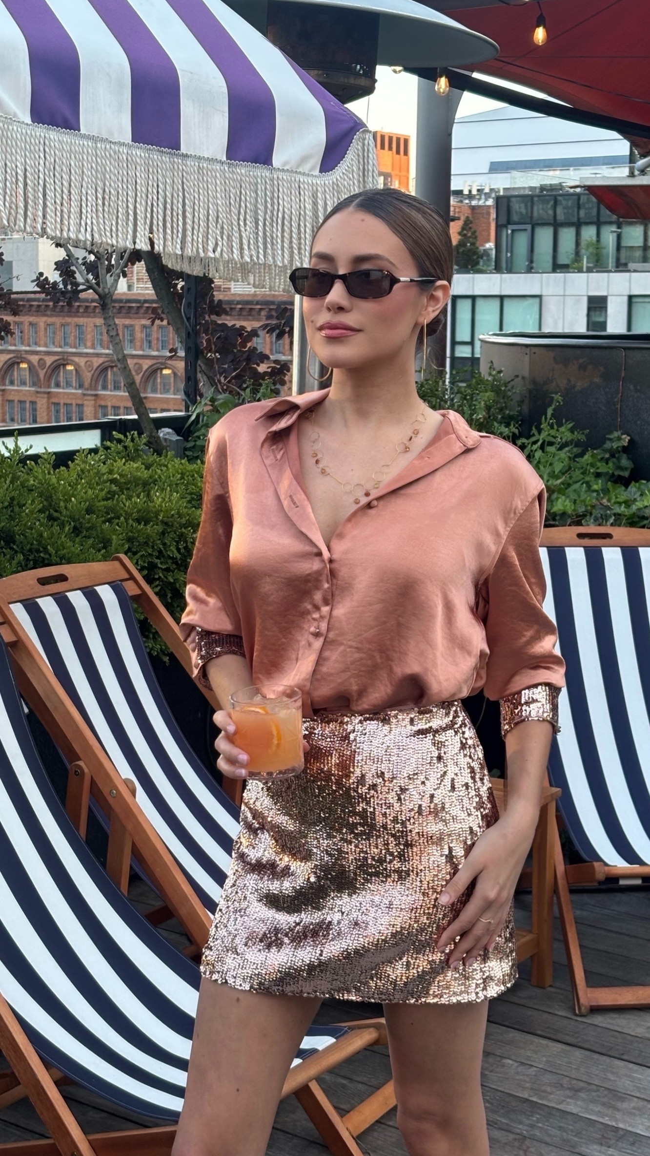 Satin, sequins, and a rooftop view. This rose gold look is one of my favorite ways to mix glamour with effortless style. Perfect for summer soirées, rooftop cocktails, weddings, or any event that calls for a little sparkle.

#LTKootd