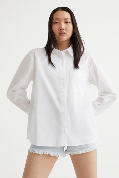 Oversized shirt in airy, crisp cotton poplin with a collar, buttons down the front, a yoke at the... | H&M (UK, MY, IN, SG, PH, TW, HK)